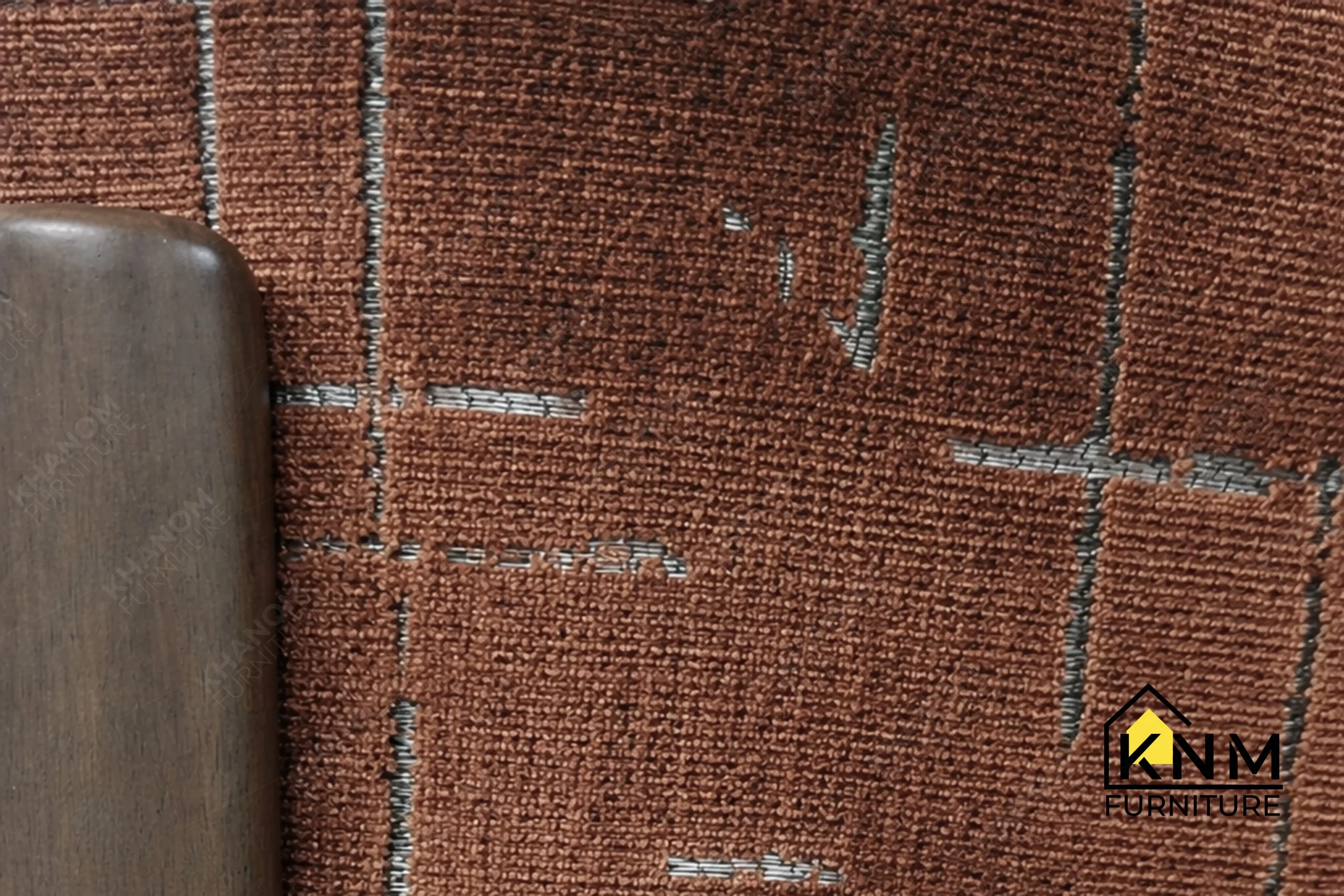Zoom detail of the premium textured fabric and cushion on a bespoke dining chair, upholstered by Khanom Furniture (KNM Furniture), a premium Upholstery factory Vietnam.