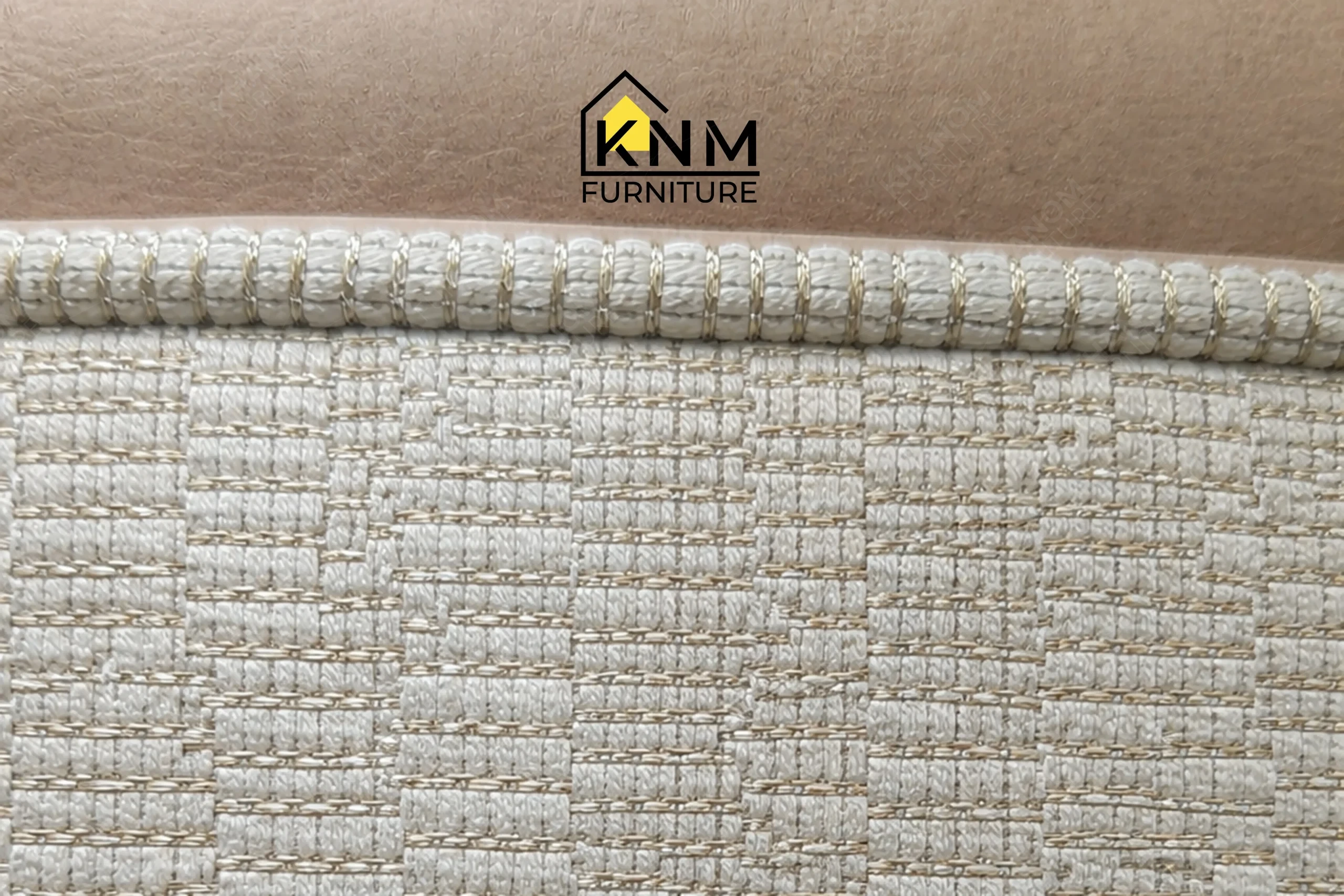 Zoom detail of the premium textured fabric upholstery and stitching on a bespoke dining chair, meticulously assembled by Khanom Furniture (KNM Furniture), your reliable Upholstery factory Vietnam.
