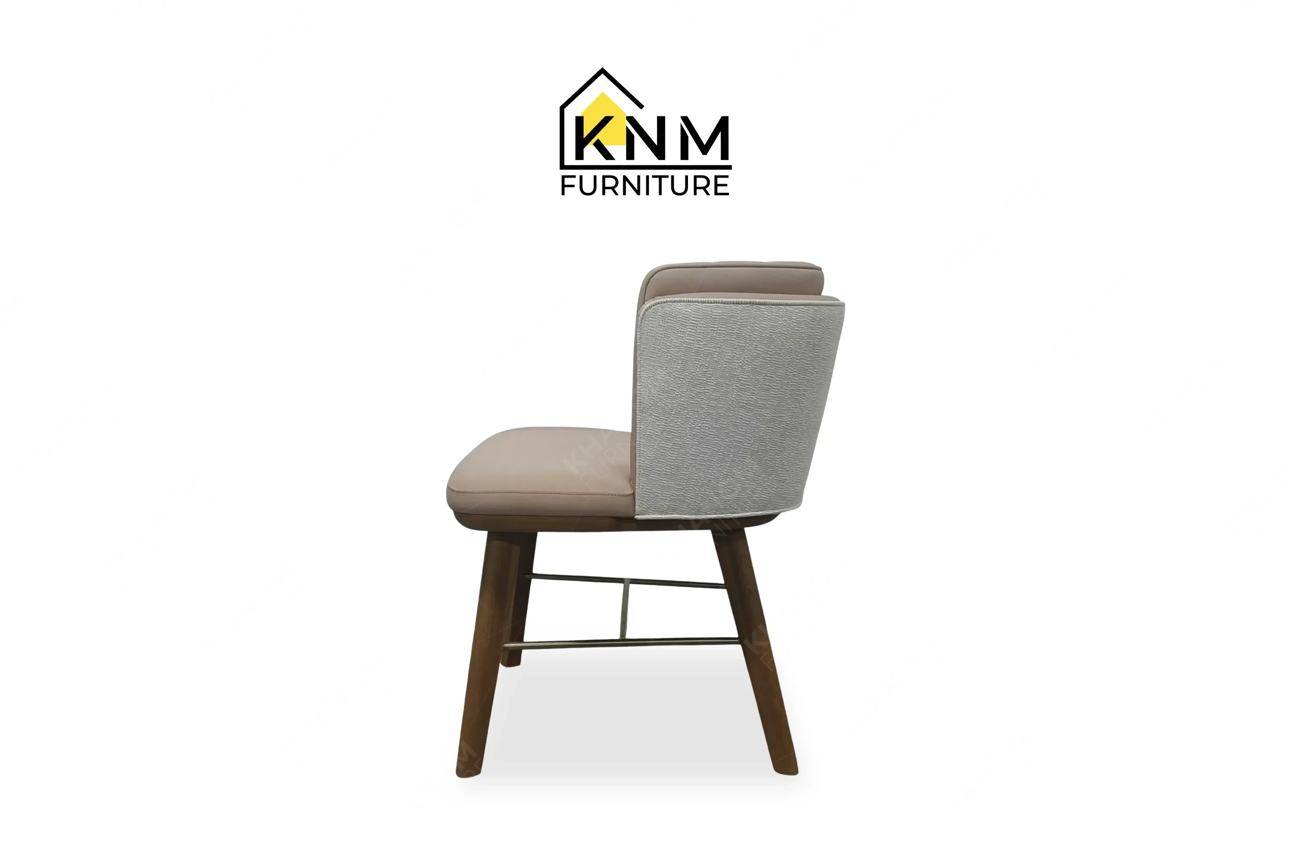 Side profile view of a sturdy custom restaurant dining chair with a solid ash wood frame and fabric tub seat, produced by Khanom Furniture (KNM Furniture), a dedicated Custom furniture factory Vietnam.