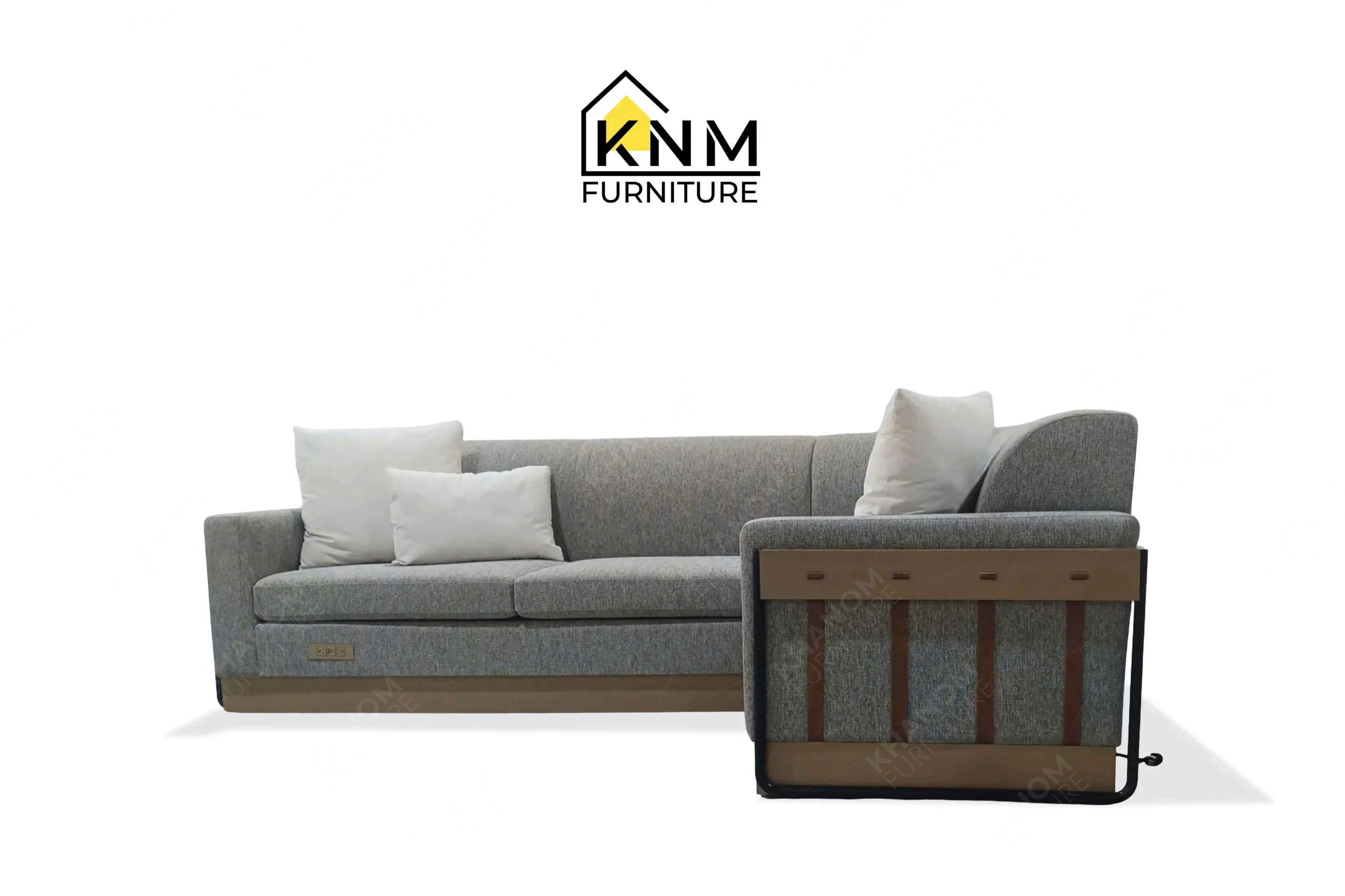 Front view of a bespoke sectional sleeper sofa featuring textured grey fabric and front-facing power outlets, custom crafted by Khanom Furniture (KNM Furniture), a renowned custom furniture manufacturer.