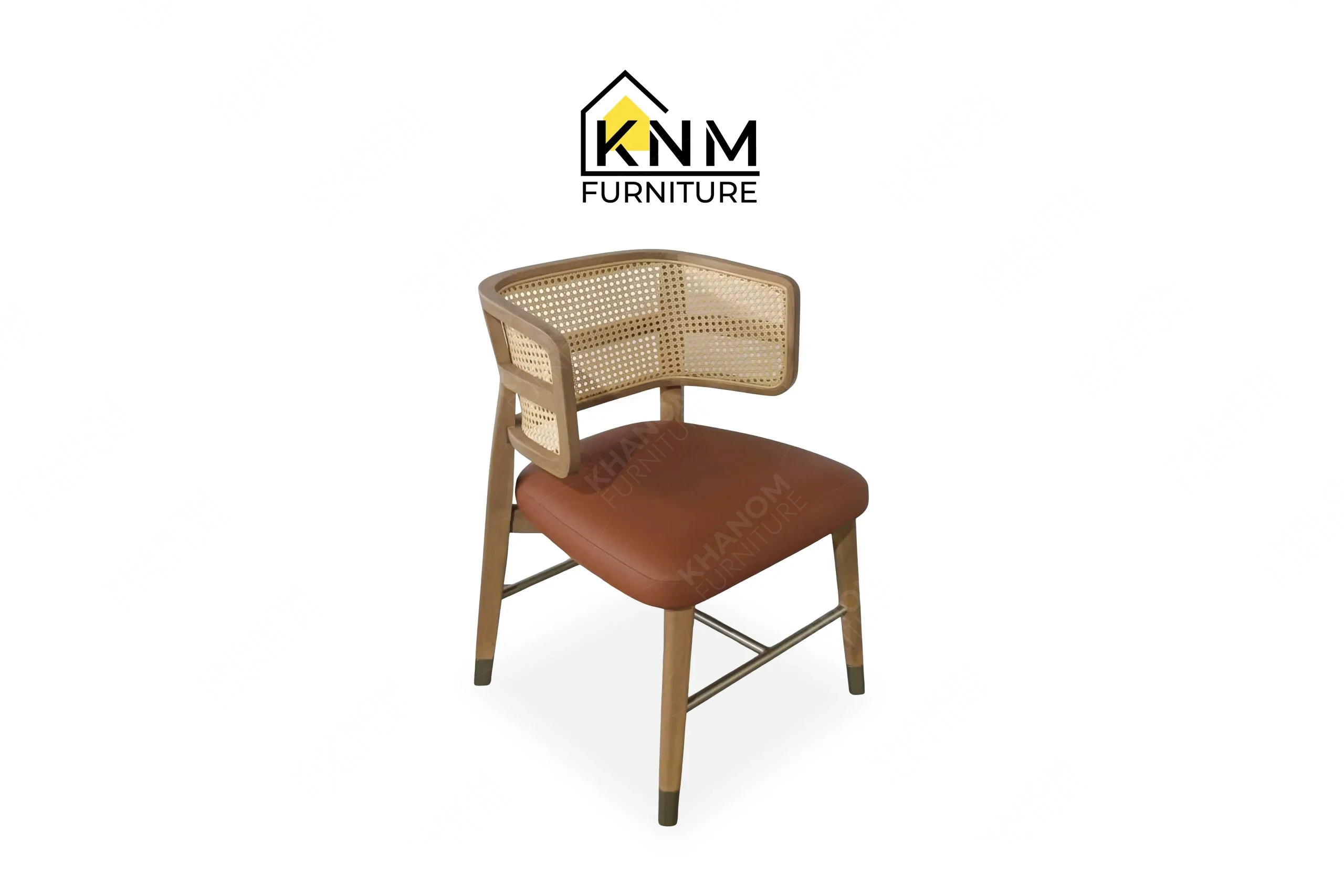 A 3/4 perspective view showing the graceful curved cane backrest and white oak frame of a bespoke dining chair with brass details, masterfully crafted by Khanom Furniture (KNM Furniture), your trusted hospitality furniture factory Vietnam.