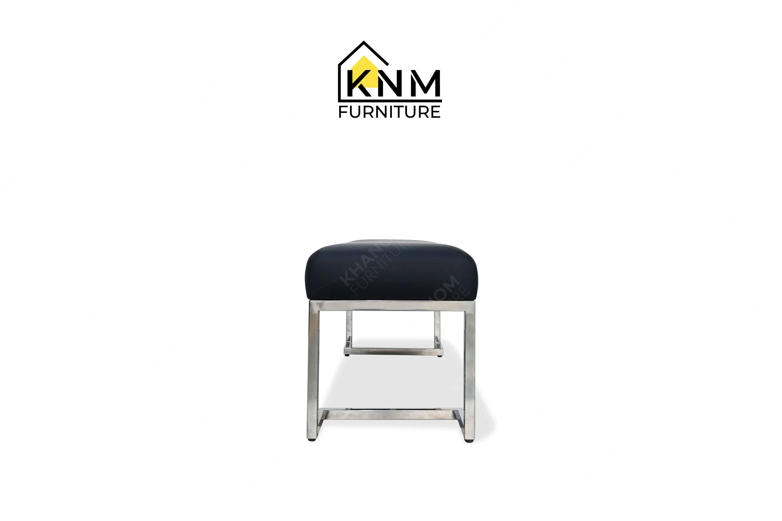 Side profile view of a sturdy contract-grade bench featuring navy performance leather and a geometric metal base, produced by Khanom Furniture (KNM Furniture), a dedicated bespoke furniture factory.