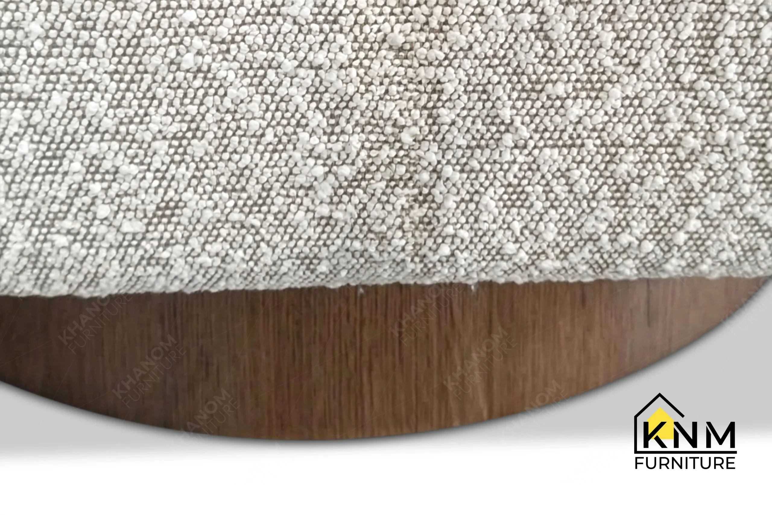 Close-up detail highlighting the refined internal craftsmanship and robust cushioning of a custom barrel chair manufactured by Khanom Furniture (KNM Furniture), an established contract furniture factory Vietnam.