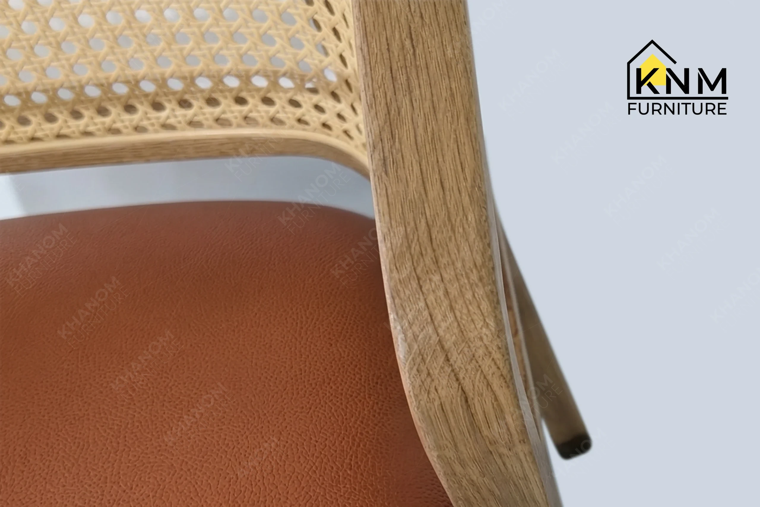 Zoom detail showcasing the premium materials and flawless finishing of a bespoke dining chair, meticulously manufactured by Khanom Furniture (KNM Furniture), your reliable custom furniture manufacturer.