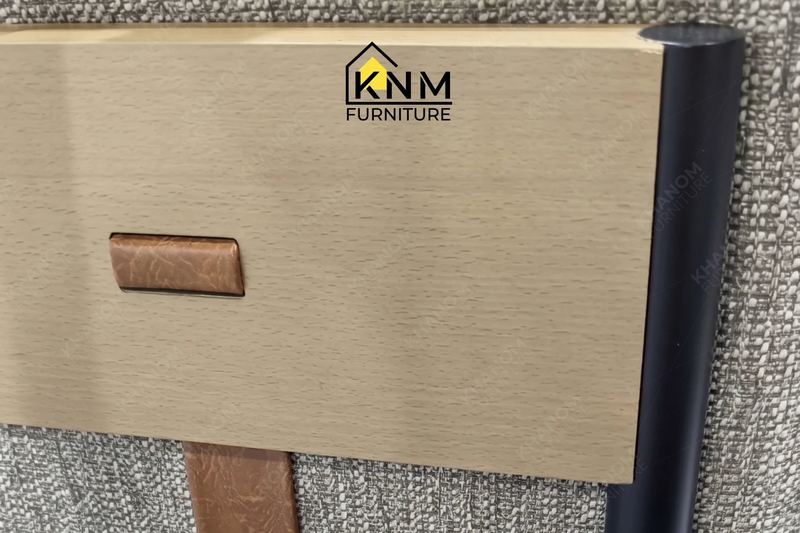 Zoom detail showcasing the premium material integration of a bespoke sleeper sectional sofa, meticulously manufactured by Khanom Furniture (KNM Furniture), your reliable custom seating manufacturer Vietnam.