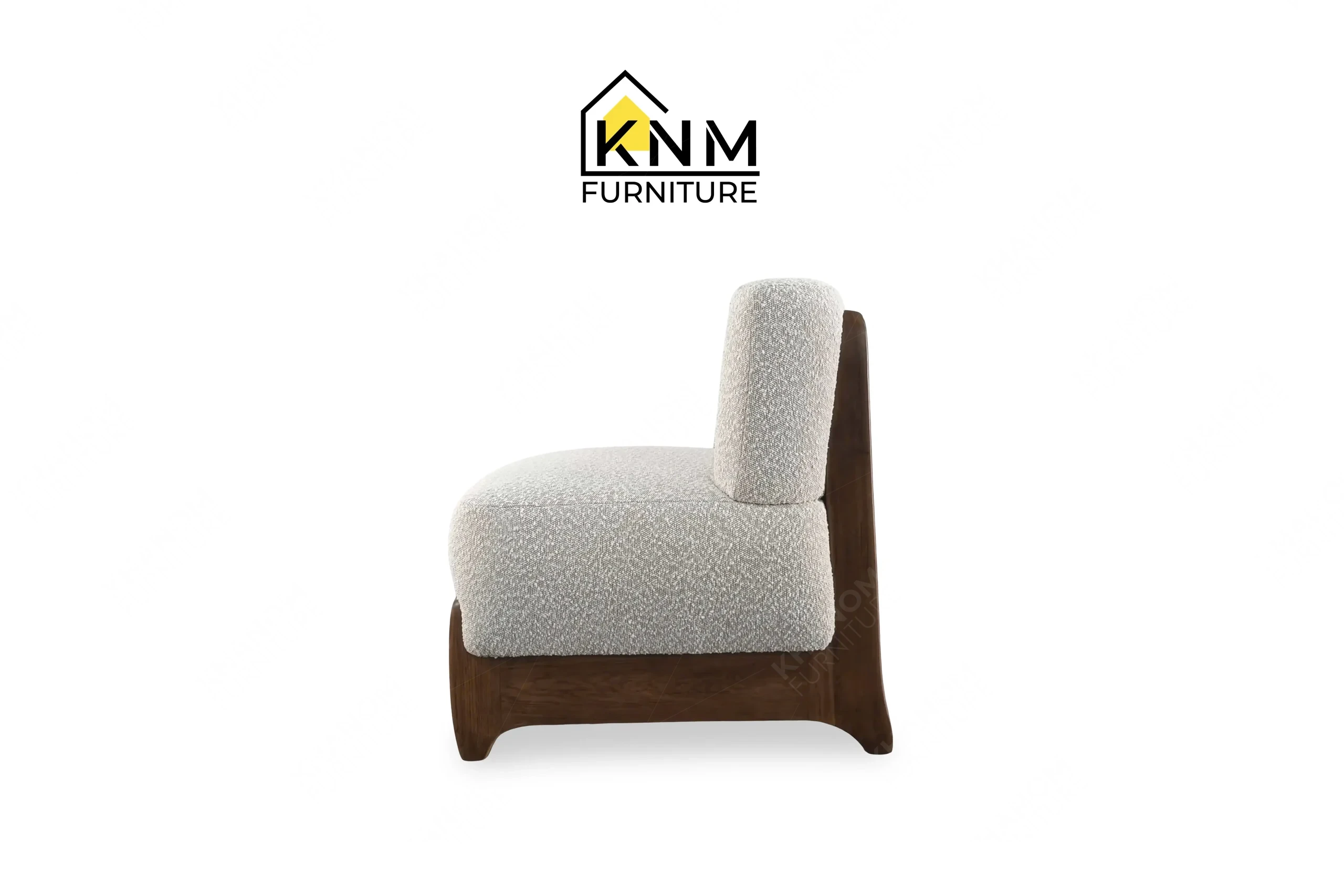 Side profile view of a sturdy contract-grade suite lounge chair with a medium oak finish base and textured fabric, produced by Khanom Furniture (KNM Furniture), a dedicated bespoke furniture factory.