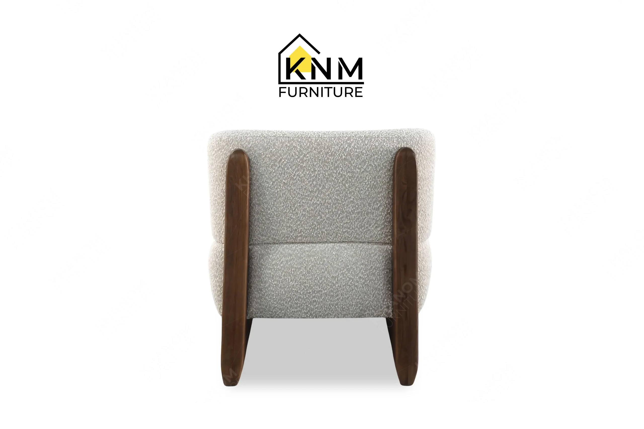 Direct back view of a premium bespoke upholstered oak lounge chair featuring textured fabric, manufactured by Khanom Furniture (KNM Furniture), a dedicated contract furniture manufacturer.