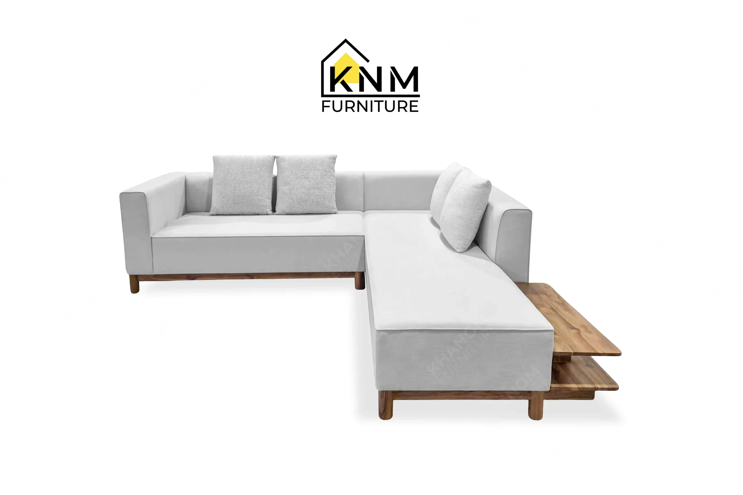 A perspective view illustrating the corner configuration and modular integration of the solid teak outdoor sectional sofa produced by Khanom Furniture.