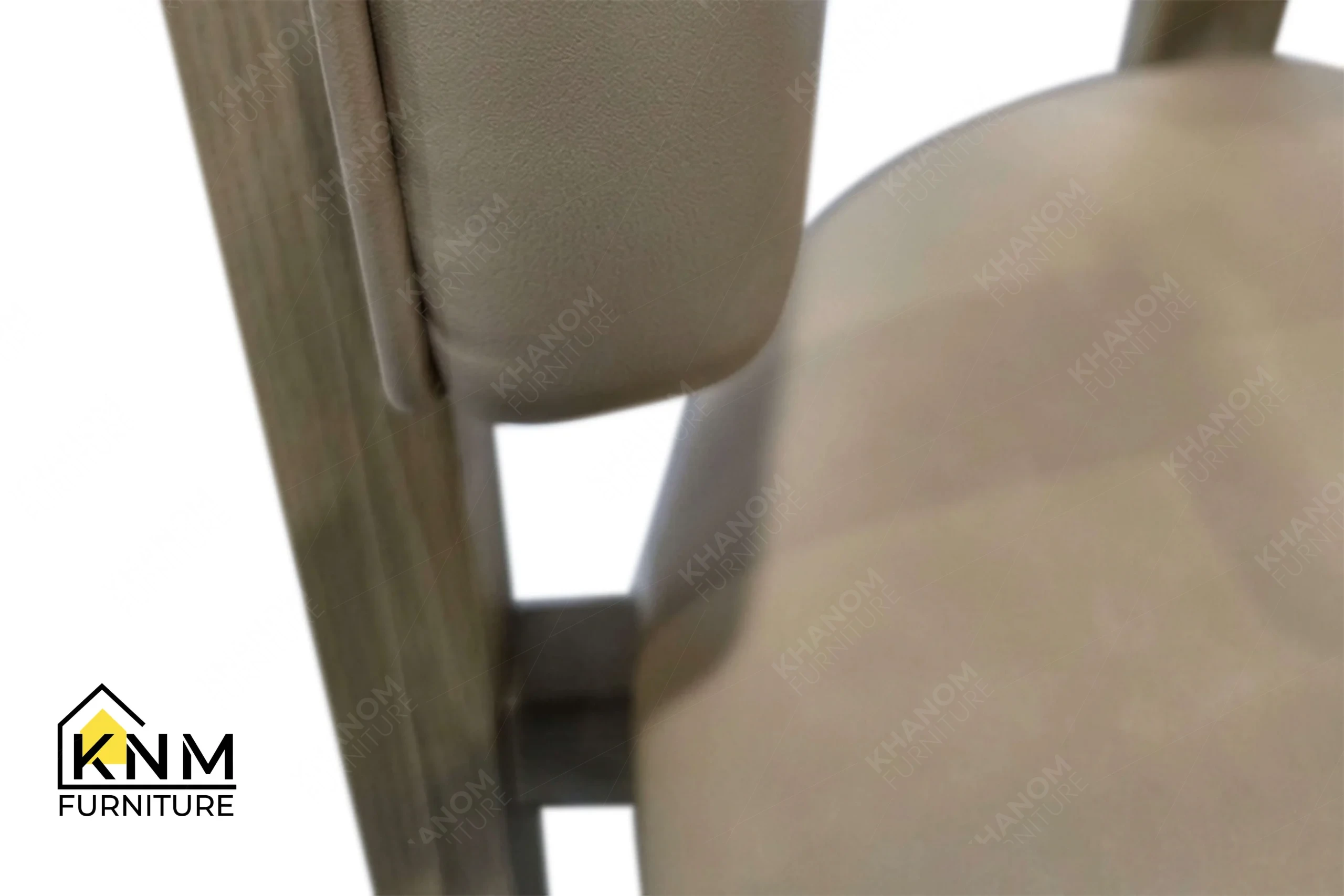 A technical detail of the solid ash curved back dining chair from Khanom Furniture, describing the wood frame joints and Teflon tap-in glides.