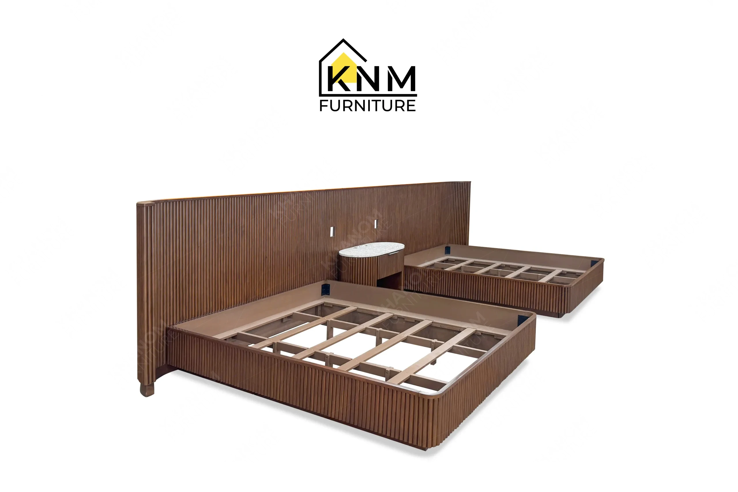 A perspective view illustrating the bed bases and curved corners of the hardwood tambour double queen bed produced by Khanom Furniture.