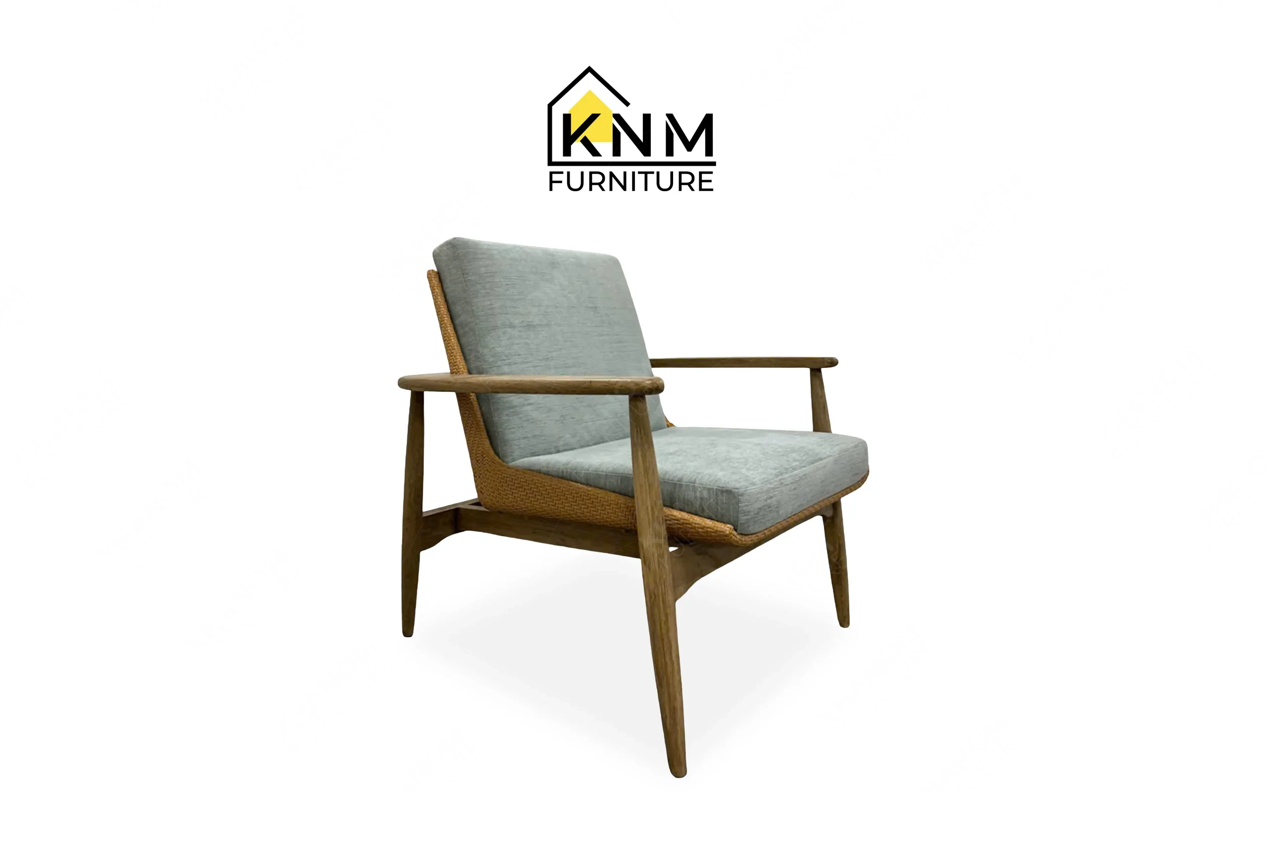 A perspective view illustrating the sculpted armrests and pitched back of the white oak synthetic caning lounge chair produced by Khanom Furniture.