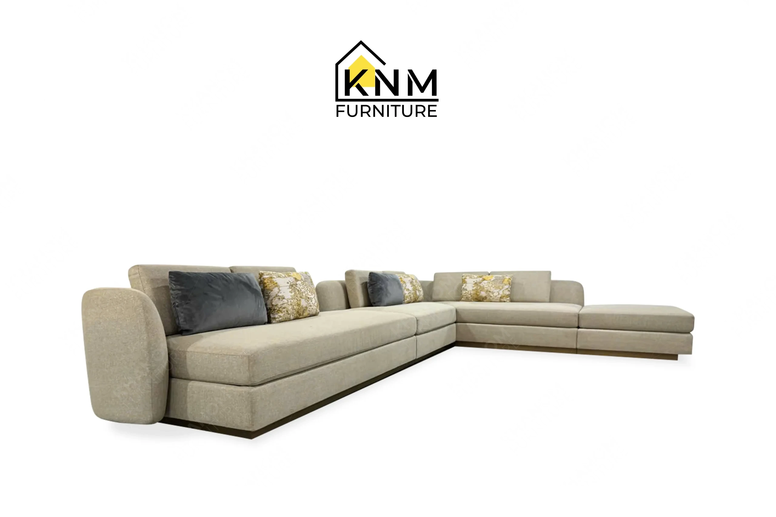 The side profile of the modular Erica Shamrock sectional sofa highlights the structural depth and Platinum Nickel metal base specified by Khanom Furniture.