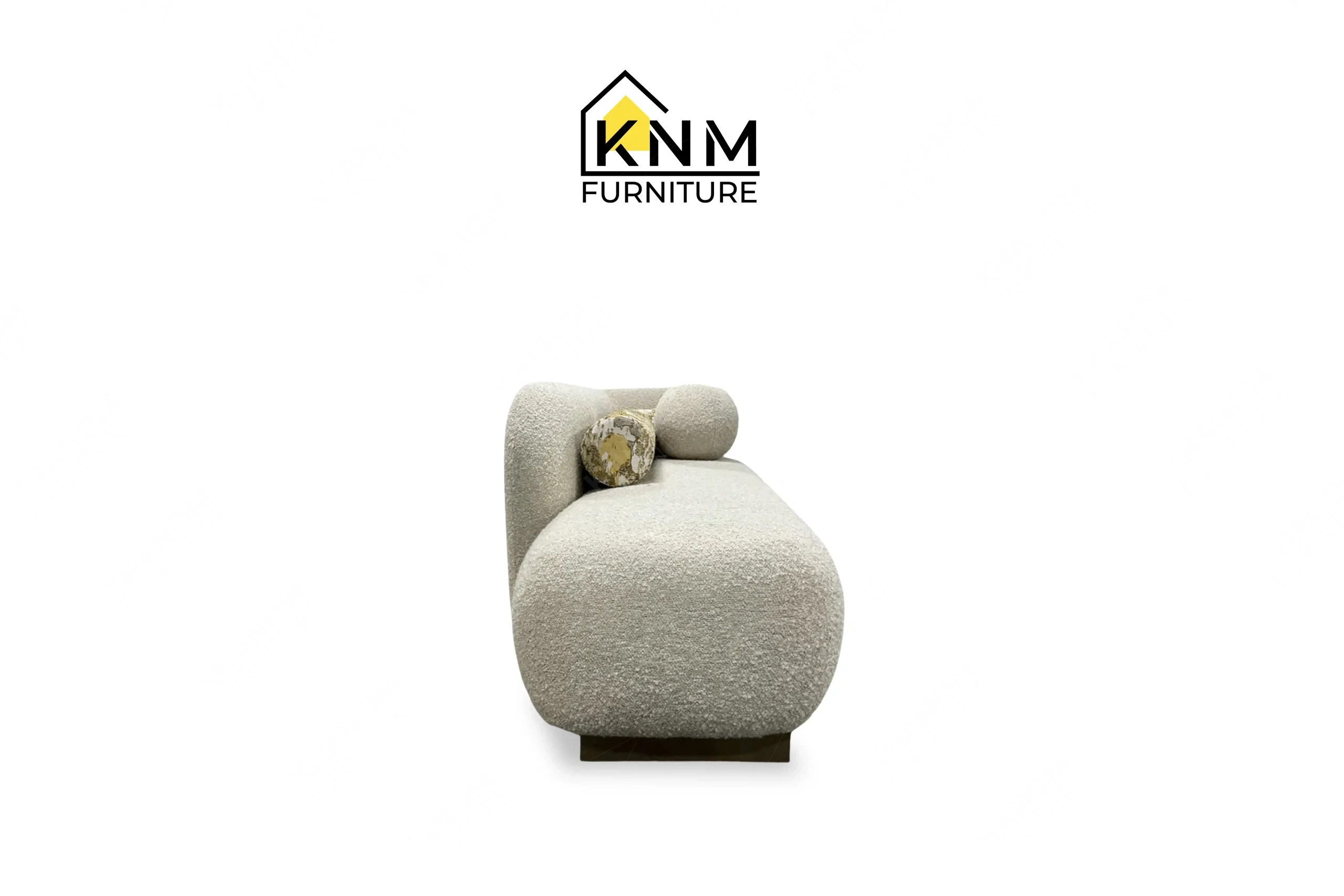 The side profile of the Opuzen fabric asymmetrical bedroom sofa highlights the structural depth and Platinum Nickel base specified by Khanom Furniture.