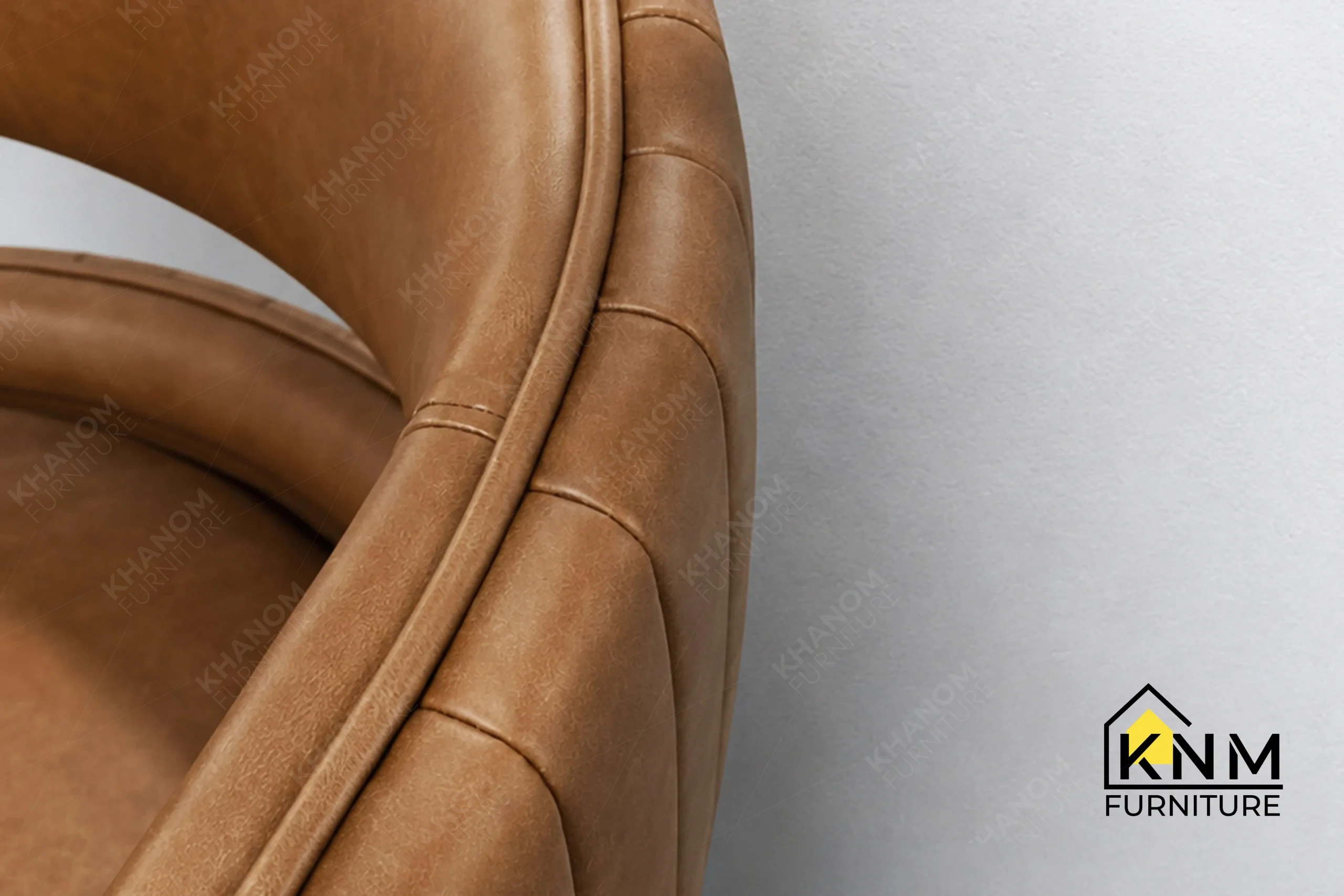 A detailed material zoom of the Dark Storm plated dining chair by Khanom Furniture, showing the Fil Doux fabric texture adjacent to the plated metal.
