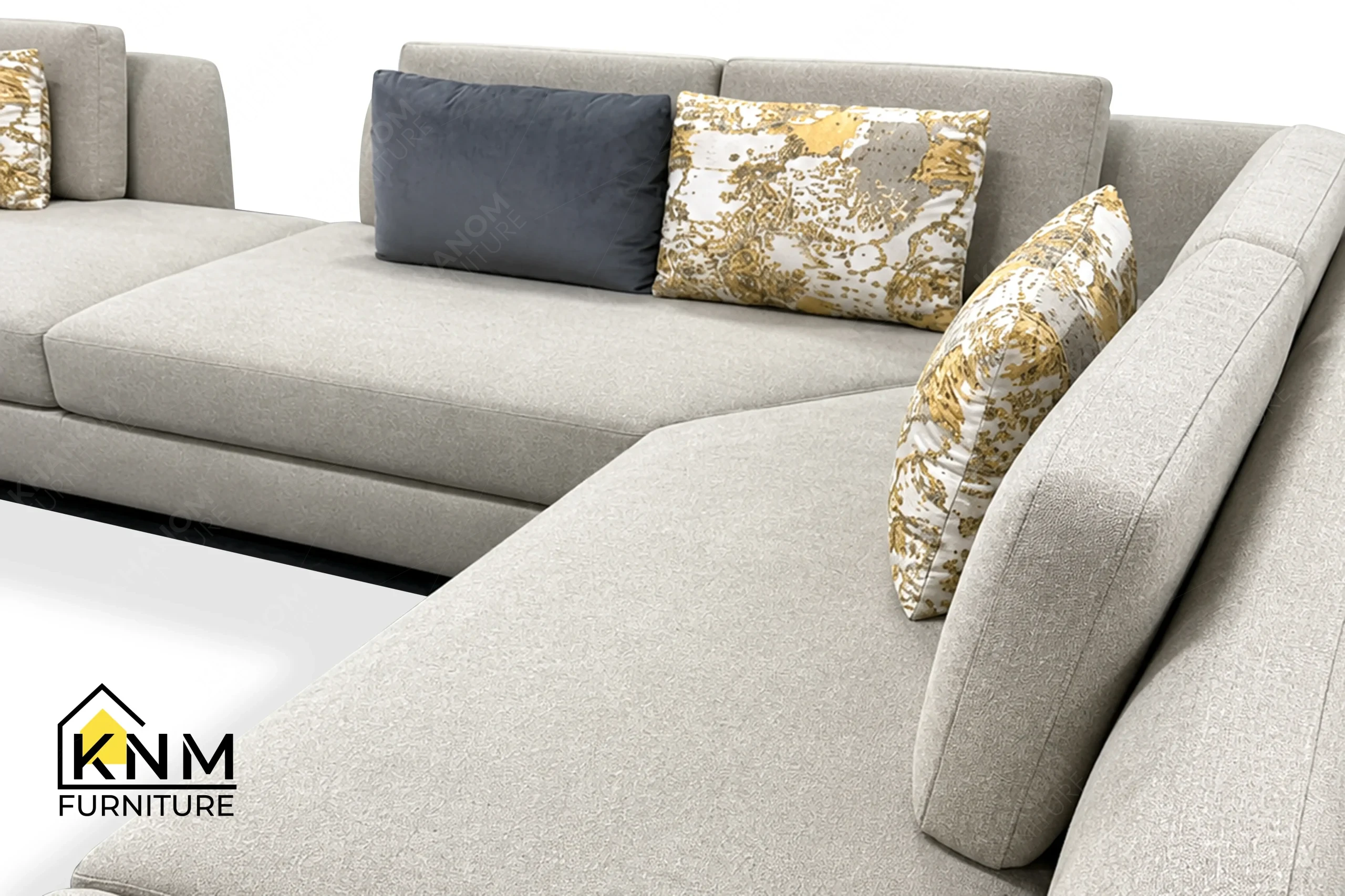 A detailed material zoom of the modular Erica Shamrock sectional sofa by Khanom Furniture, showing the primary fabric adjacent to the specialized accent pillows.