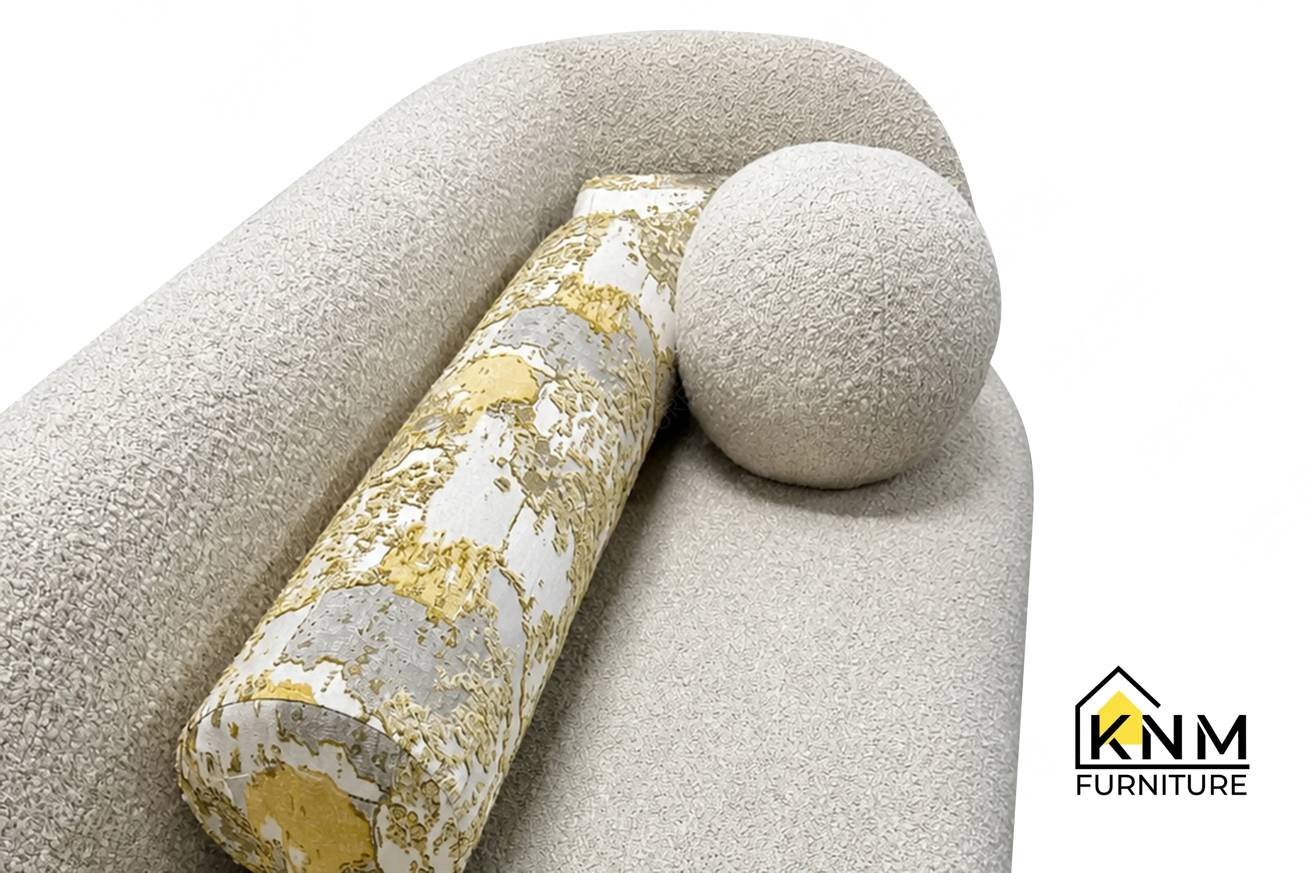 A technical detail of the Opuzen fabric asymmetrical bedroom sofa from Khanom Furniture, describing the custom round pillow and Nobilis bolster.