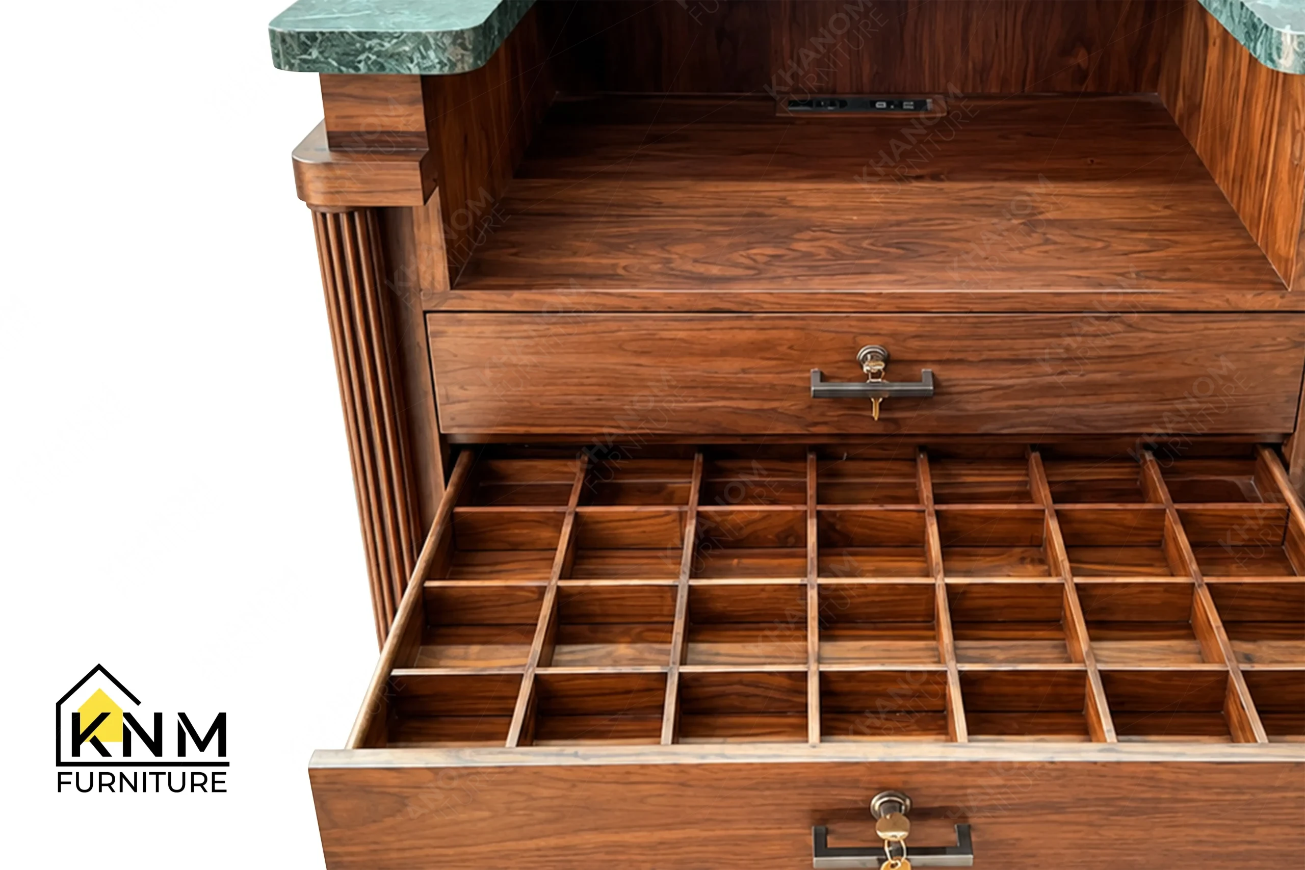 A detailed material zoom of the stone top teak valet bell desk by Khanom Furniture, showing the green stone surface adjacent to the teak frame.