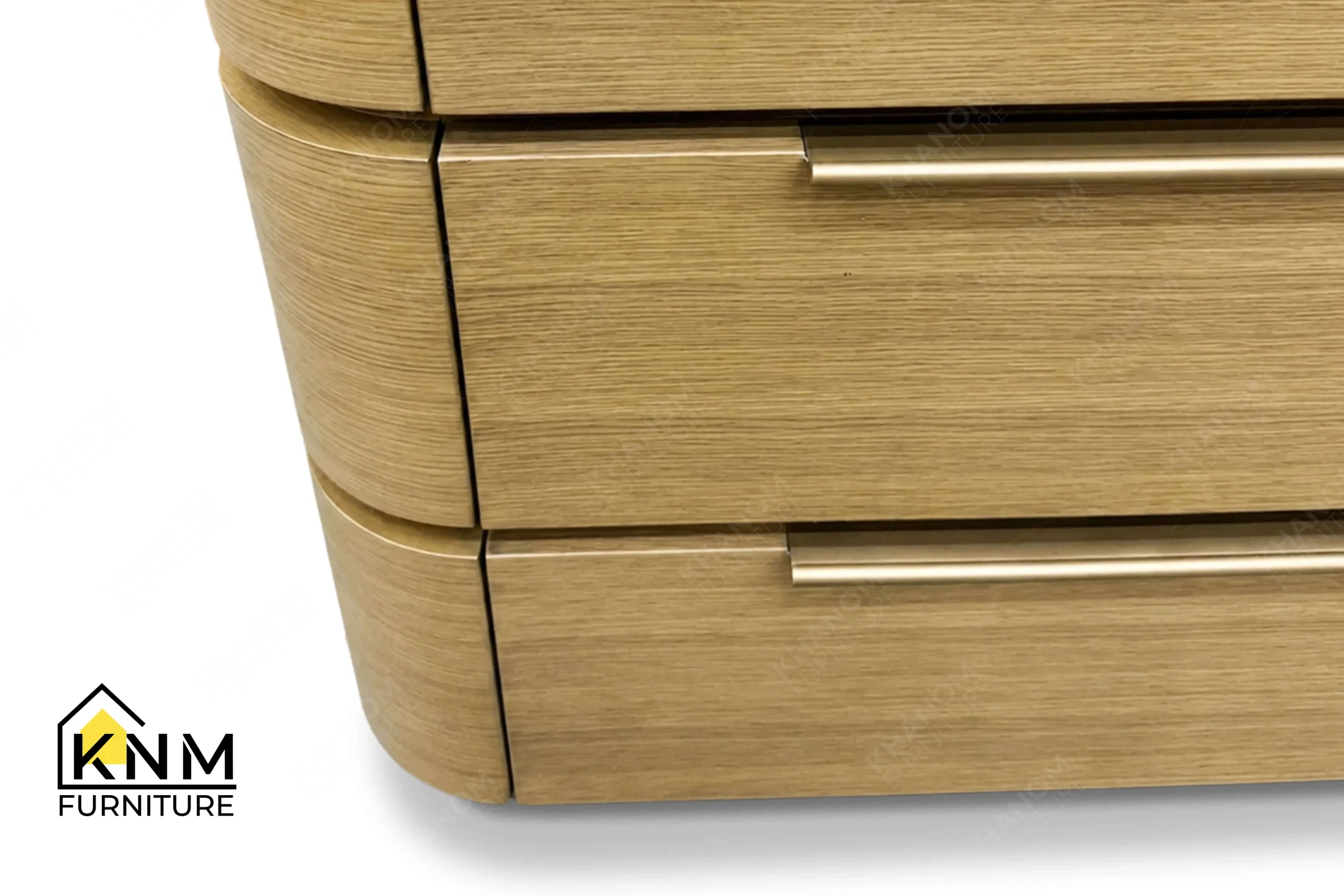 A detailed material zoom of the Vicostone top white oak console desk by Khanom Furniture, showing the linear oak grain adjacent to the quartz and metal pulls.