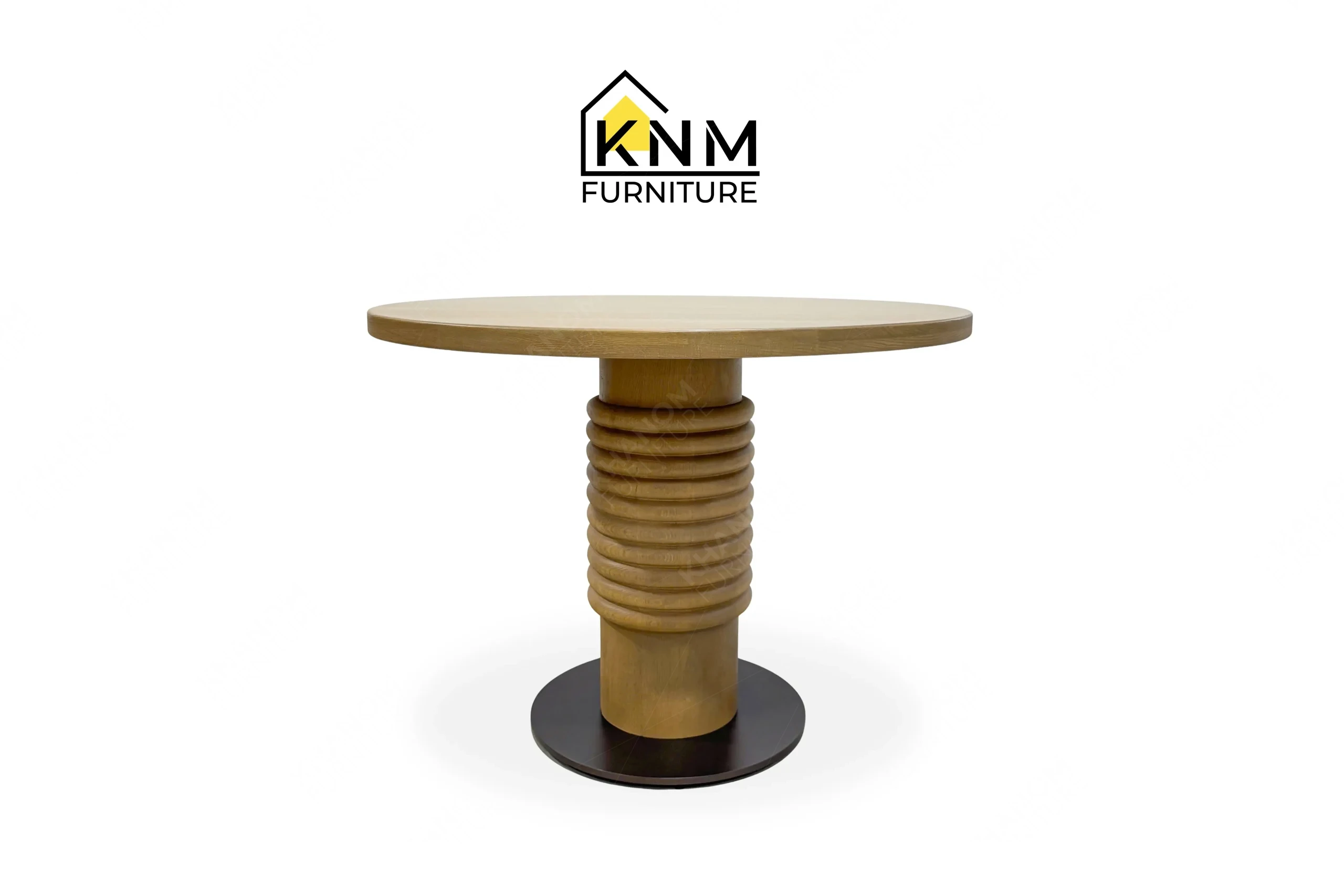 This front view displays the quarter cut oak banquette dining table manufactured by Khanom Furniture, highlighting the ribbed central pedestal and compact metal base.