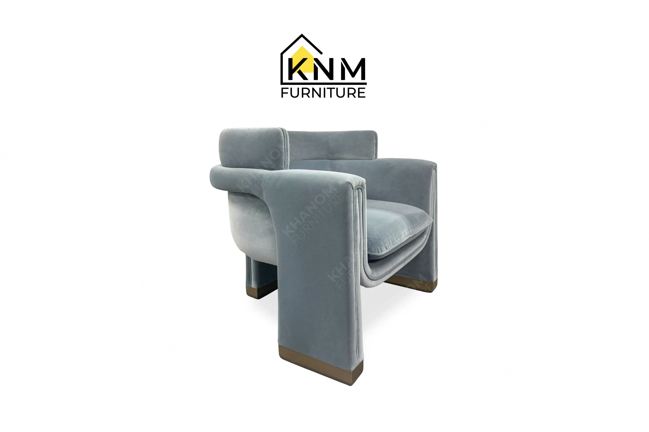 A perspective view illustrating the deep seating profile of the Momentum fabric upholstered lounge chair produced by Khanom Furniture.