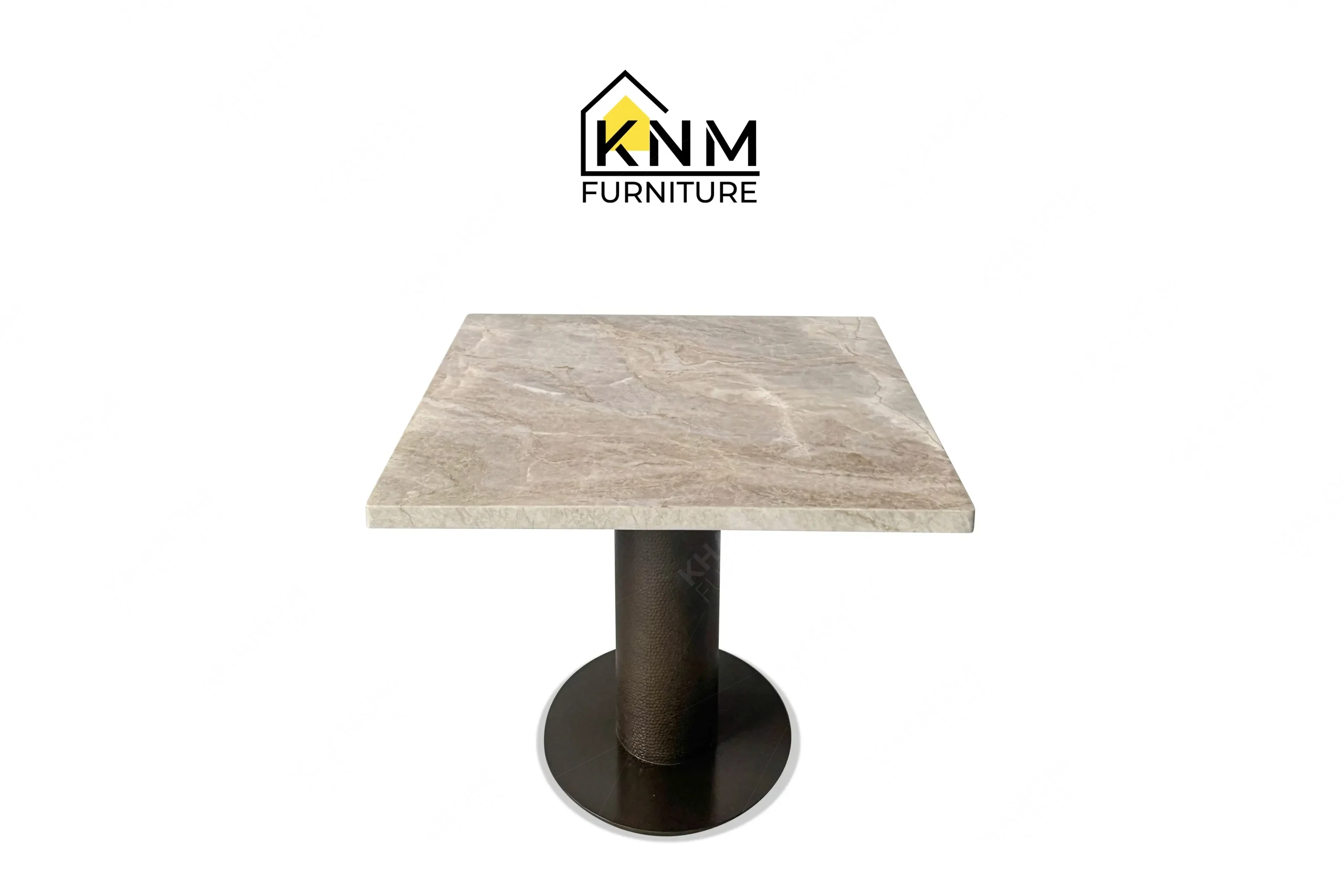 A perspective view illustrating the metal pedestal and square stone top of the stone top metal pedestal dining table produced by Khanom Furniture.