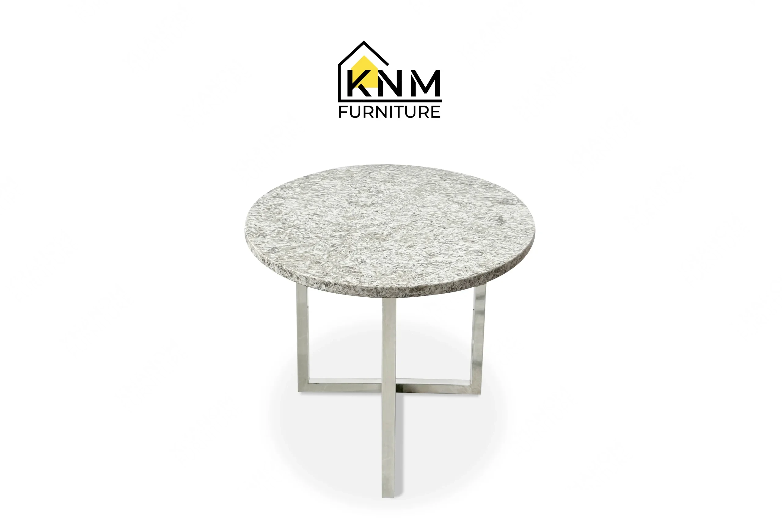 The side profile of the Cambria quartz chrome cocktail table highlights the square eased edge and polished base specified by Khanom Furniture.