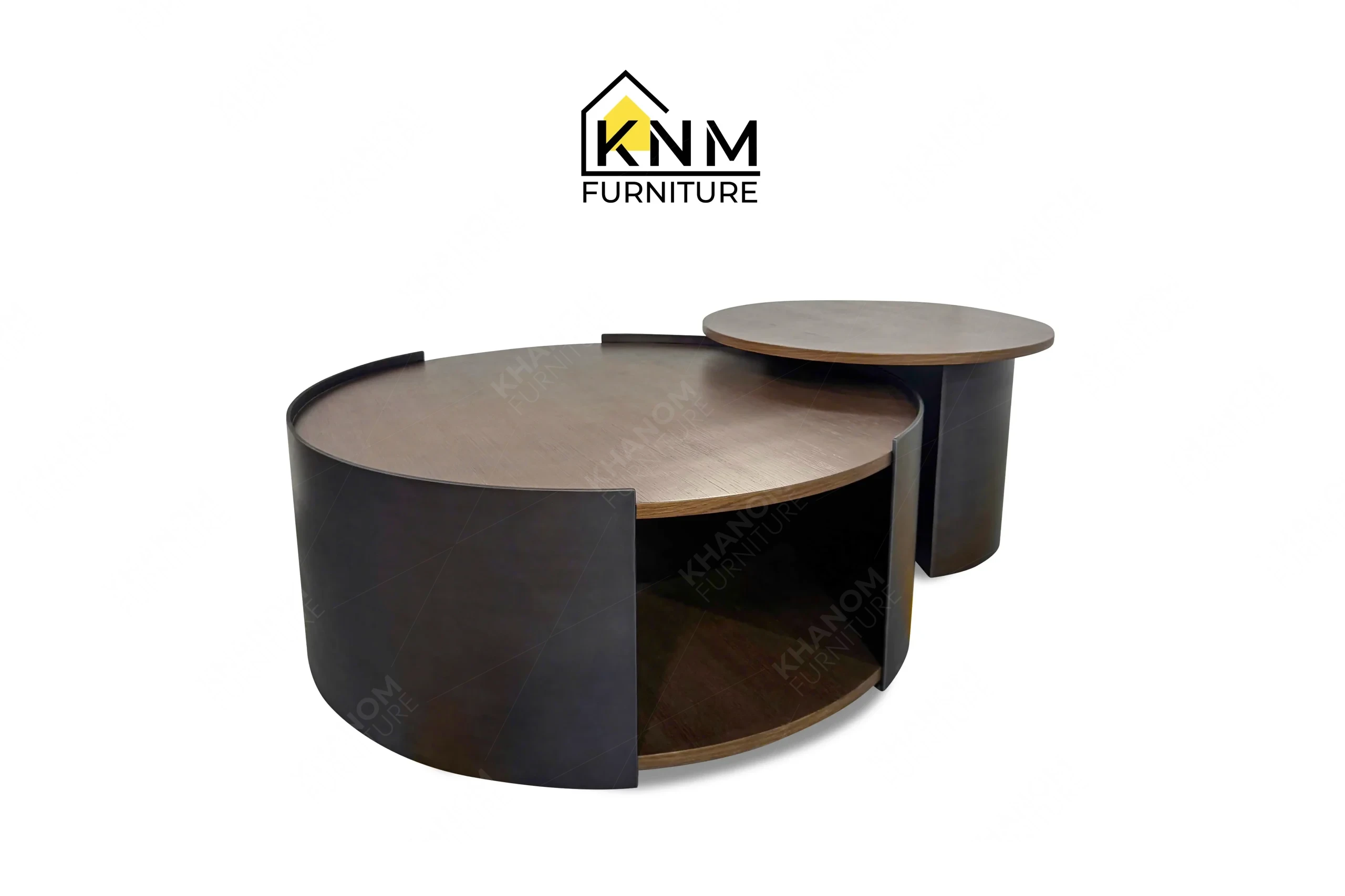 The side profile of the quarter cut oak nesting coffee table highlights the curved metal cladding specified by Khanom Furniture.