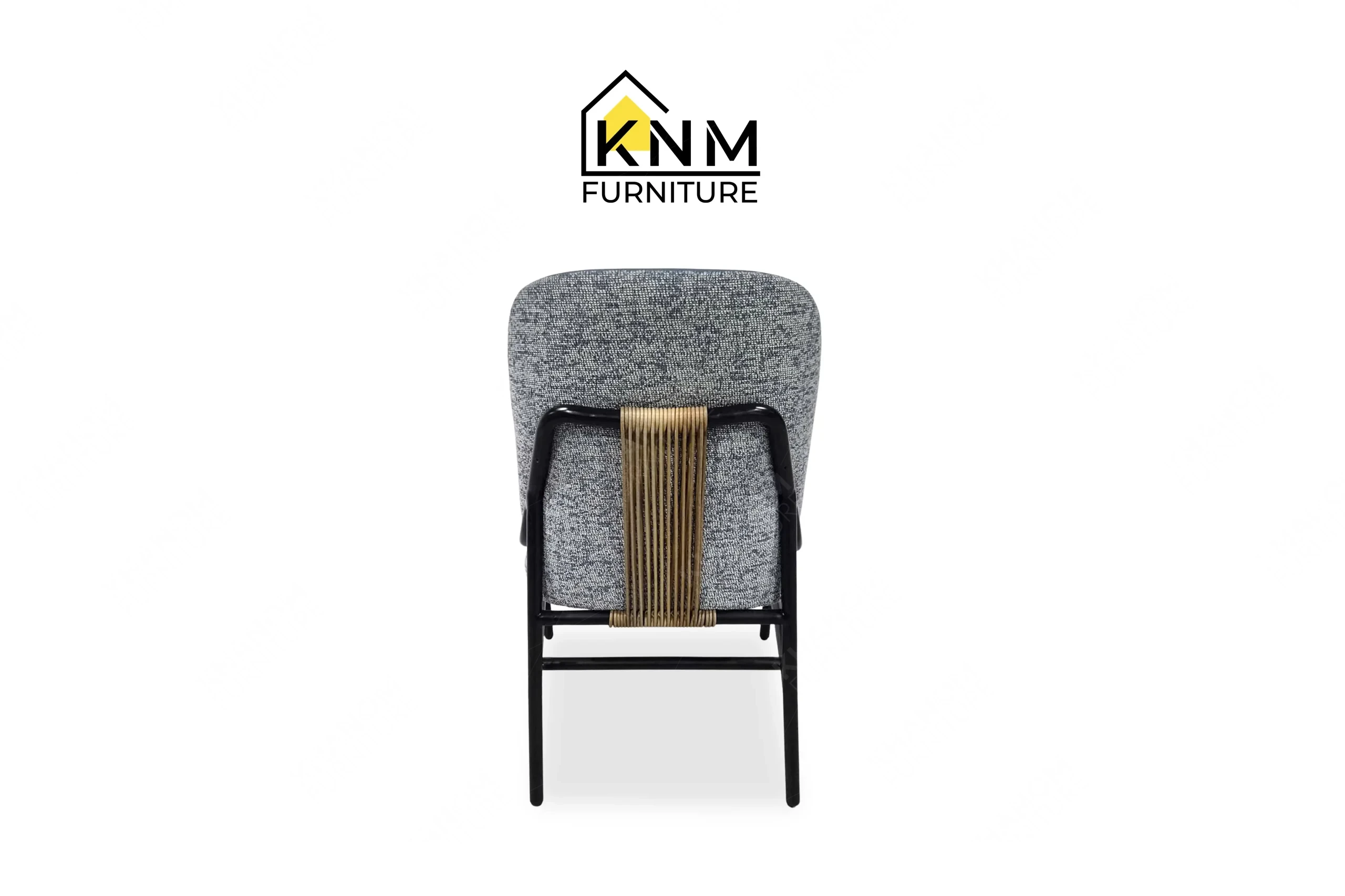 This rear view captures the Erica Shamrock upholstery and aluminum frame of the double walled aluminum upholstered dining chair engineered by Khanom Furniture.