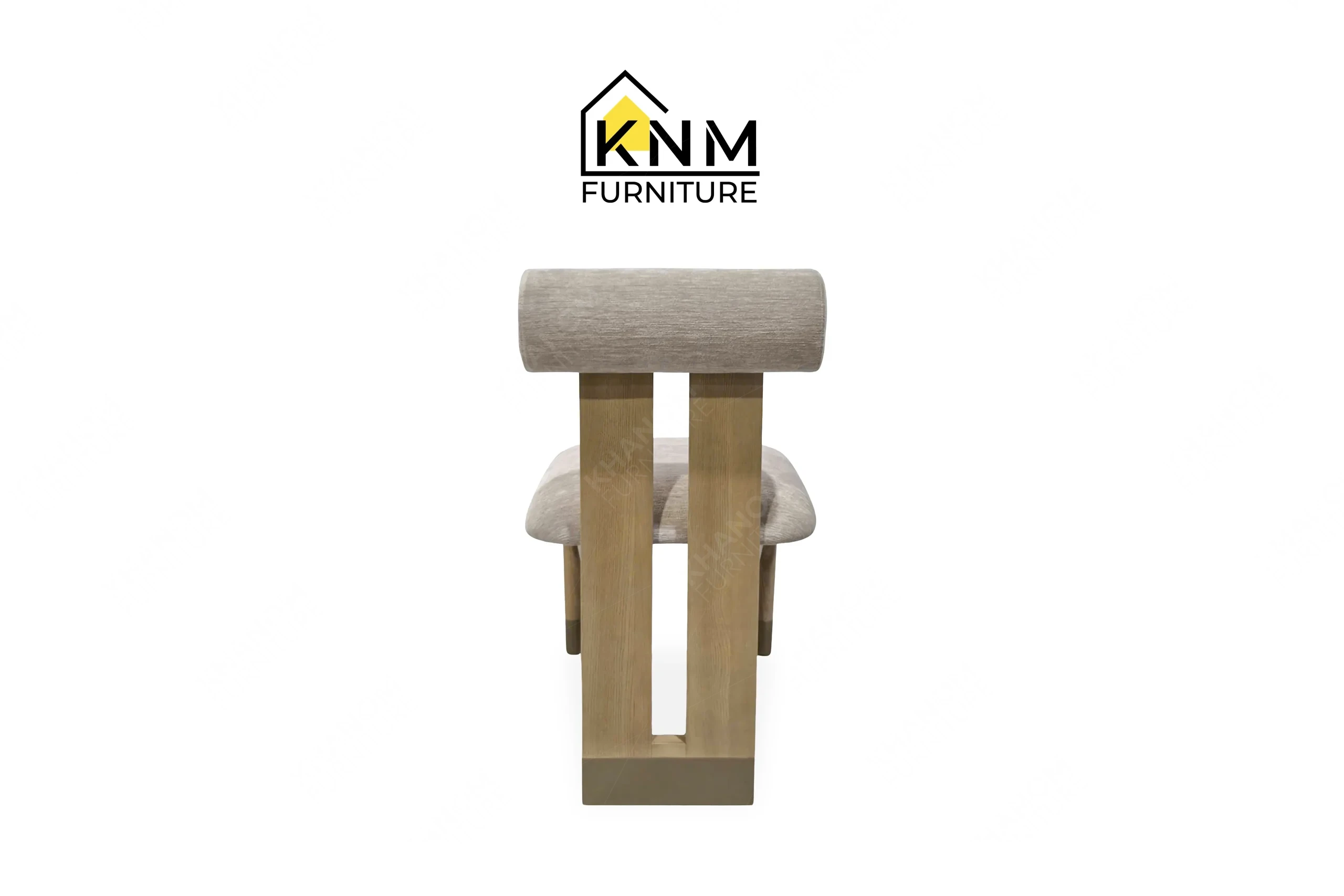 This rear view captures the exposed ash wood grain and tight upholstery of the metal sabot ash wood desk chair engineered by Khanom Furniture.