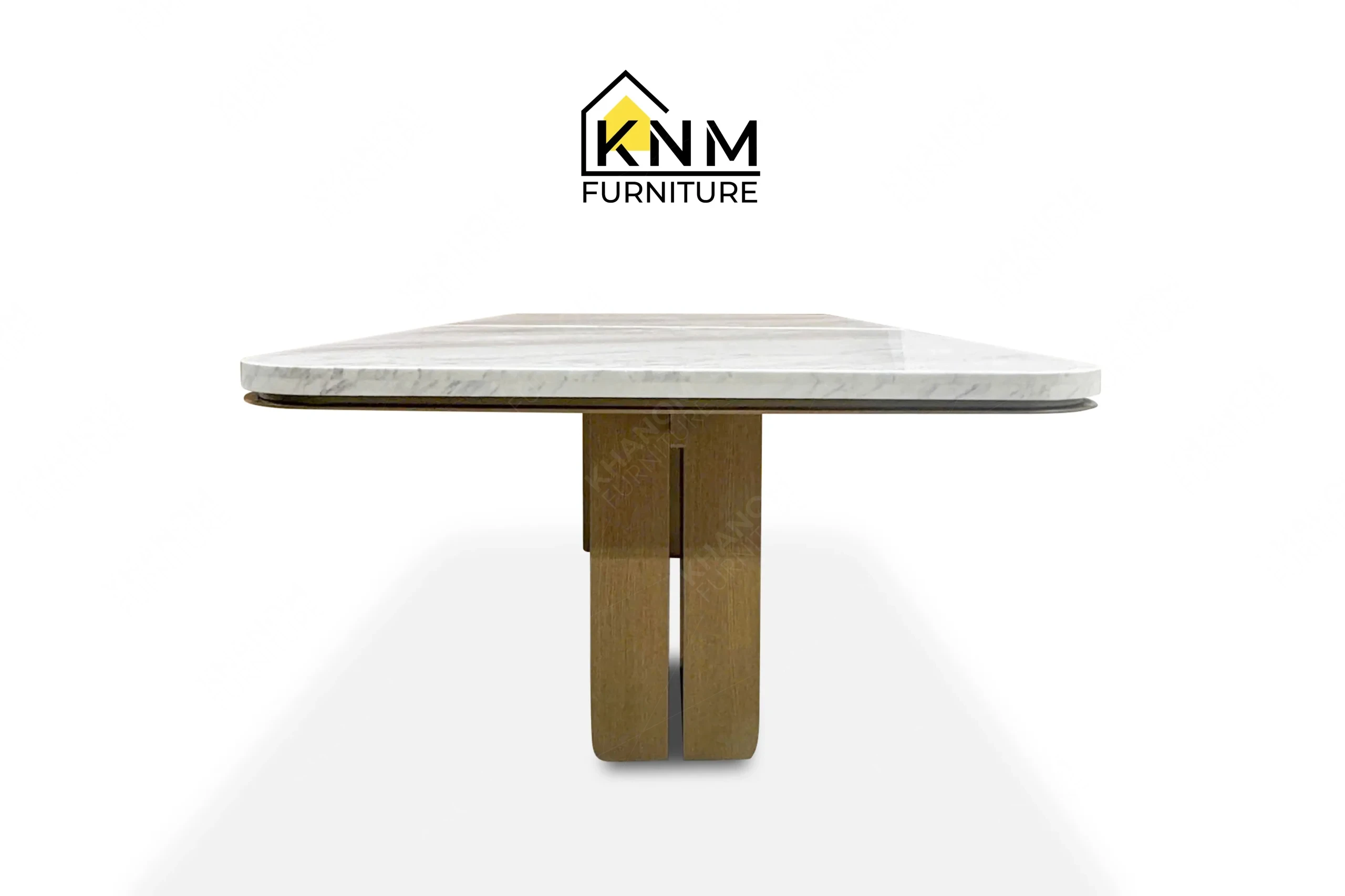 This rear view captures the wood and metal bases of the Volakas marble Stoneguard oak dining table engineered by Khanom Furniture.