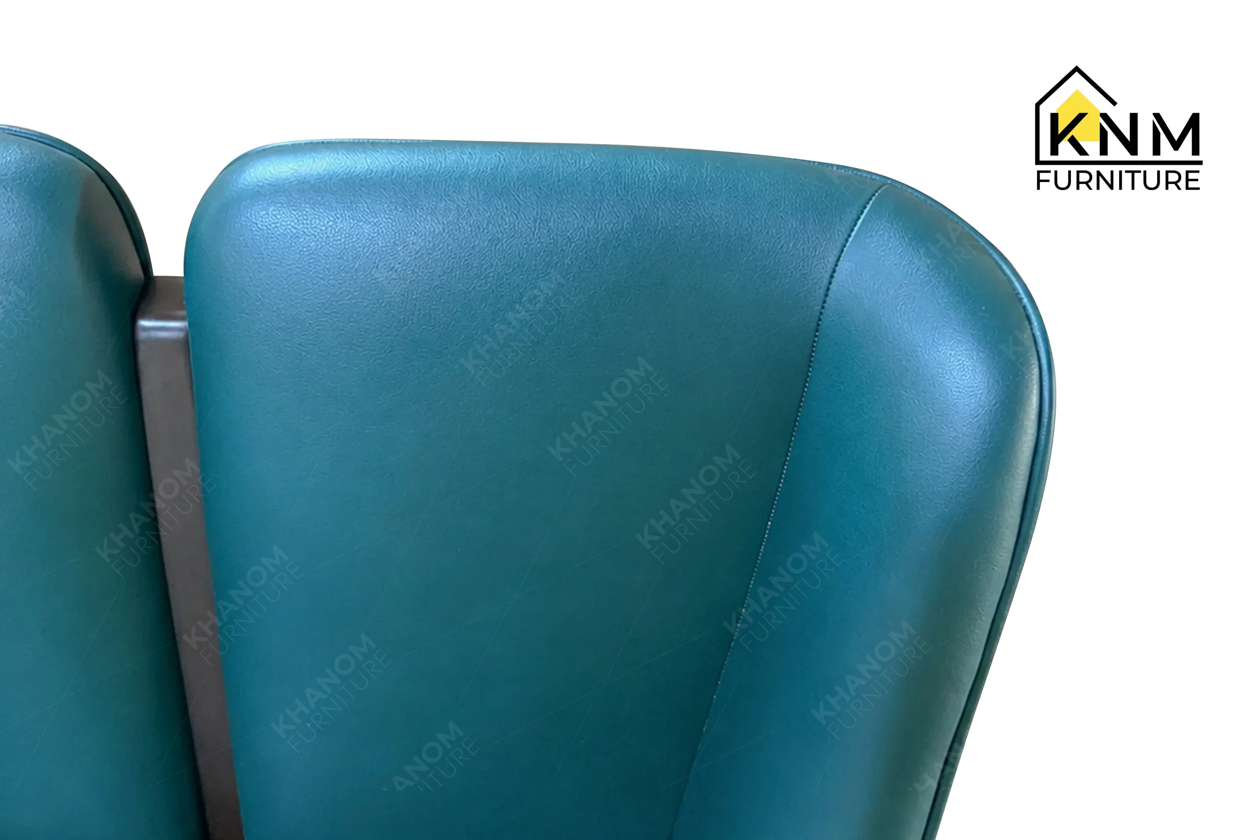 A detailed material zoom of the Forest Green leather split back barstool by Khanom Furniture, showing the reinforced tight leather seat surface.