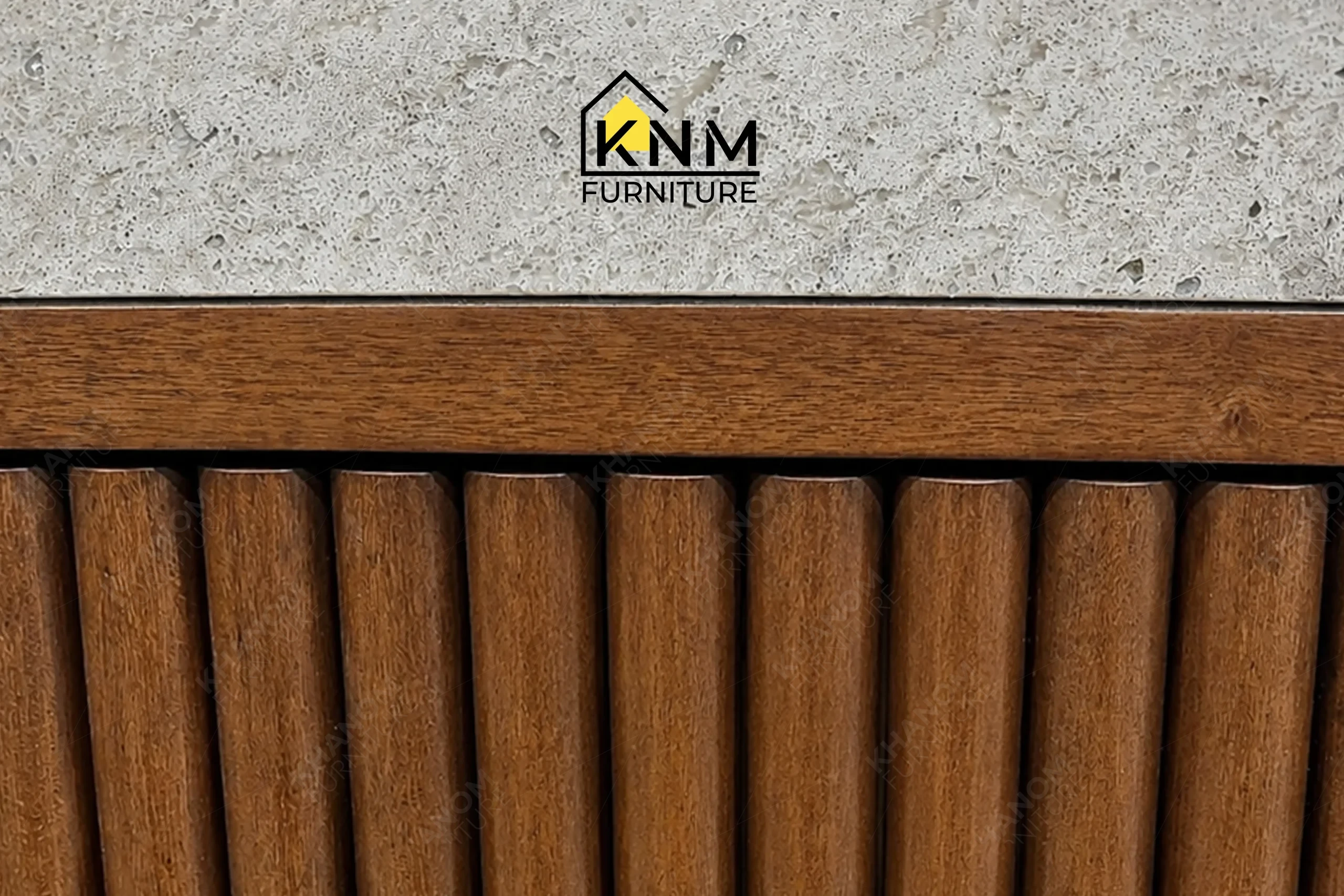 The surface texture detail of the integrated quartz top tambour media desk manufactured by Khanom Furniture reveals the polished finish of the continuous Quartz top.