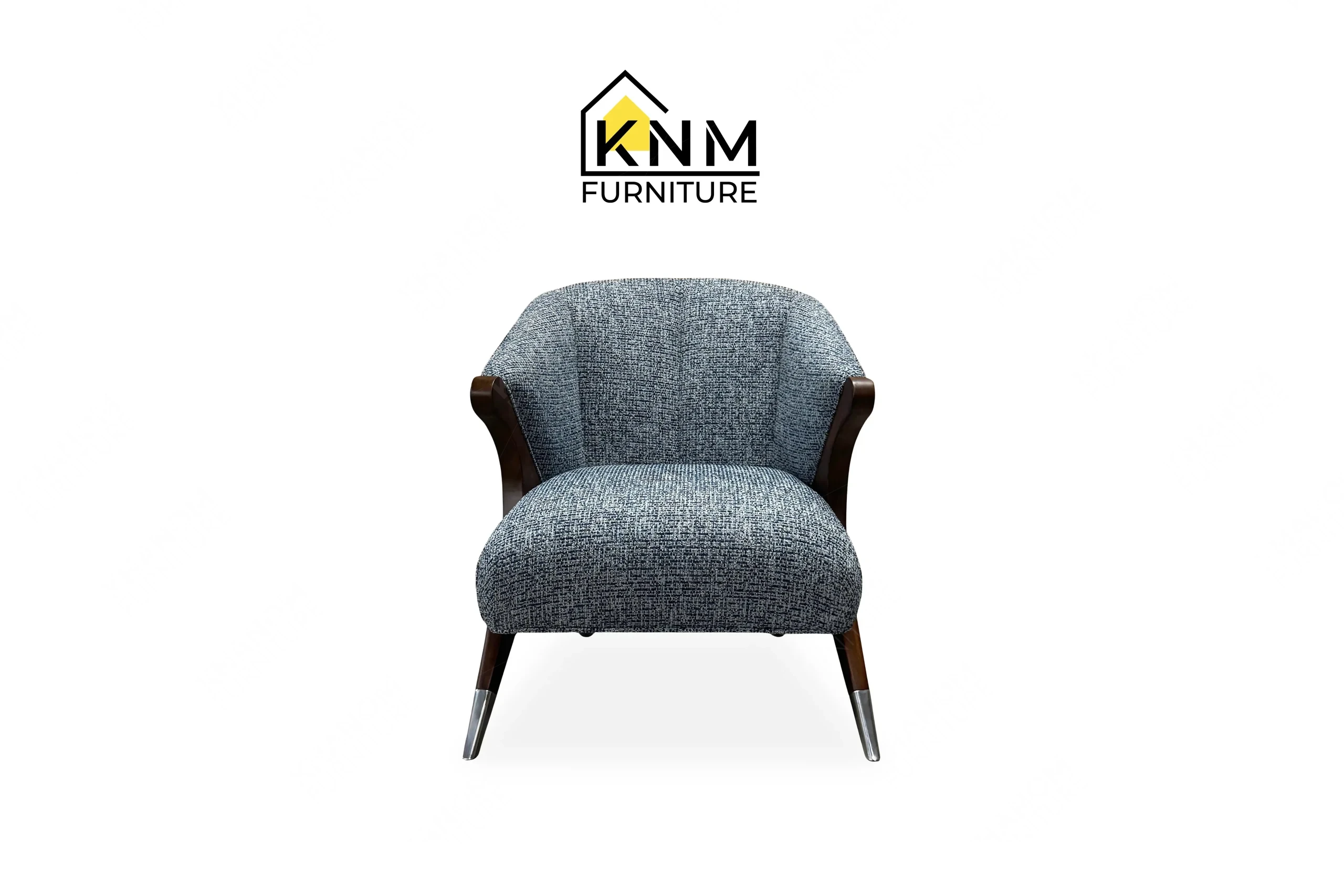 This front view displays the Fabricut upholstered hardwood lounge chair manufactured by Khanom Furniture, highlighting the tight seat and exposed wood frame.