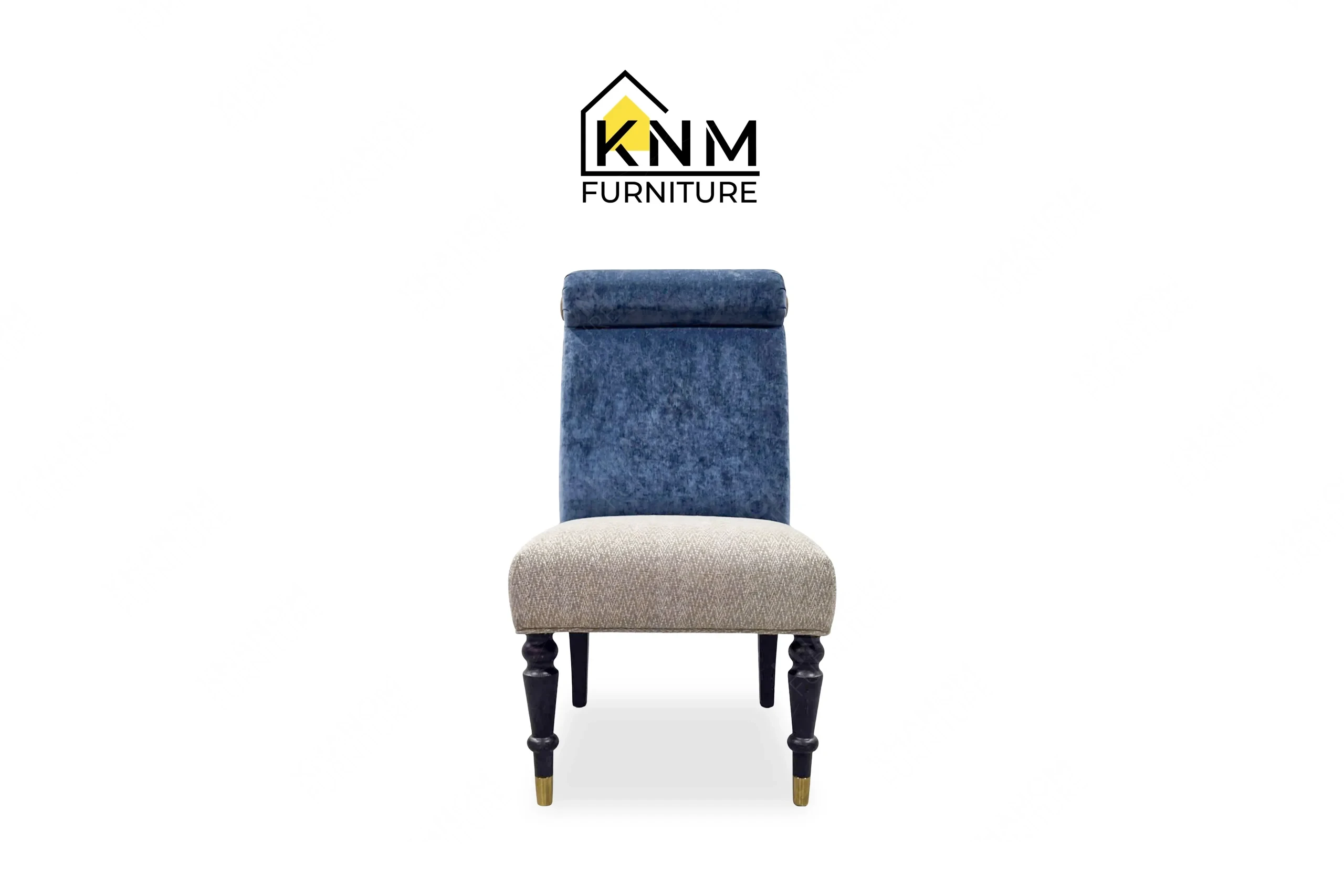 This front view displays the multi-COM rolled back dining chair manufactured by Khanom Furniture, highlighting the dual-fabric upholstery and brass front ferrules.