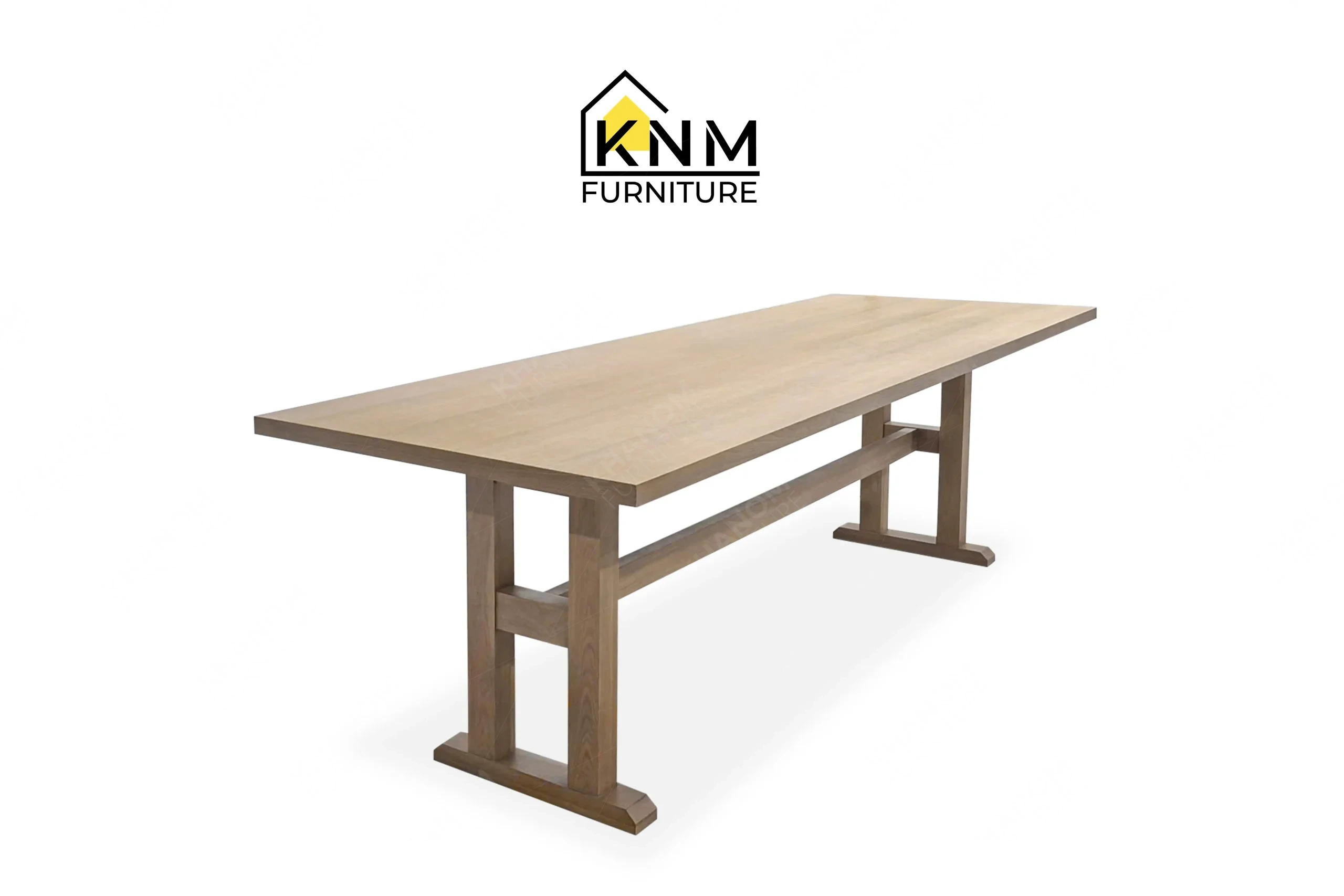 A perspective view illustrating the solid oak framing and massive top of the 120-inch solid oak communal table produced by Khanom Furniture.