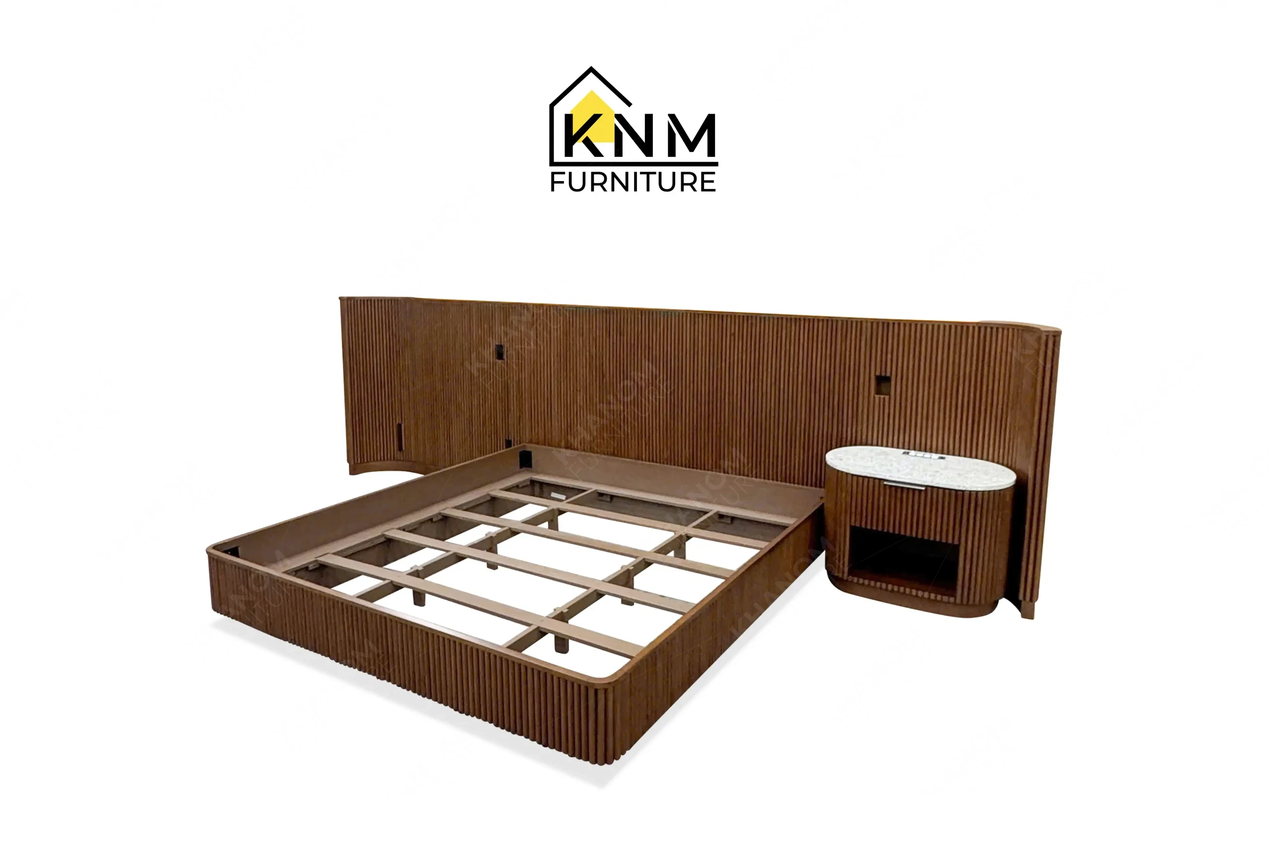 A perspective view illustrating the slatted frame and floating nightstands of the fluted hardwood King bed system produced by Khanom Furniture.