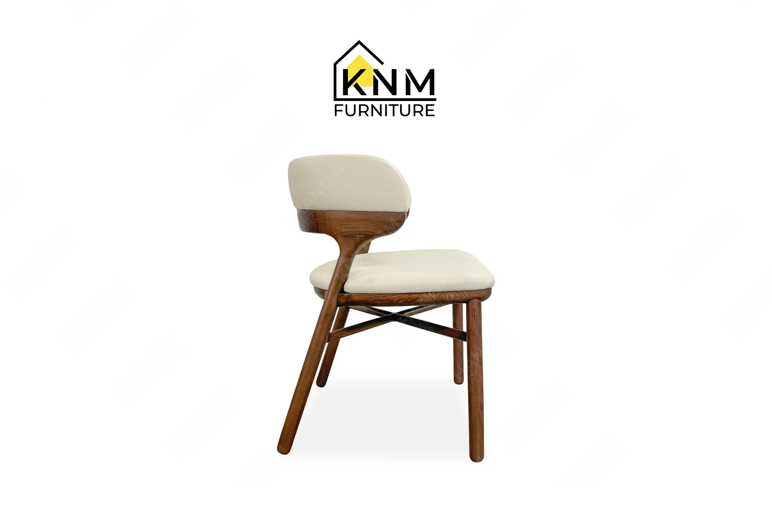 The side profile of the Ash solid wood upholstered dining chair highlights the seat pitch and structural side rails specified by Khanom Furniture.