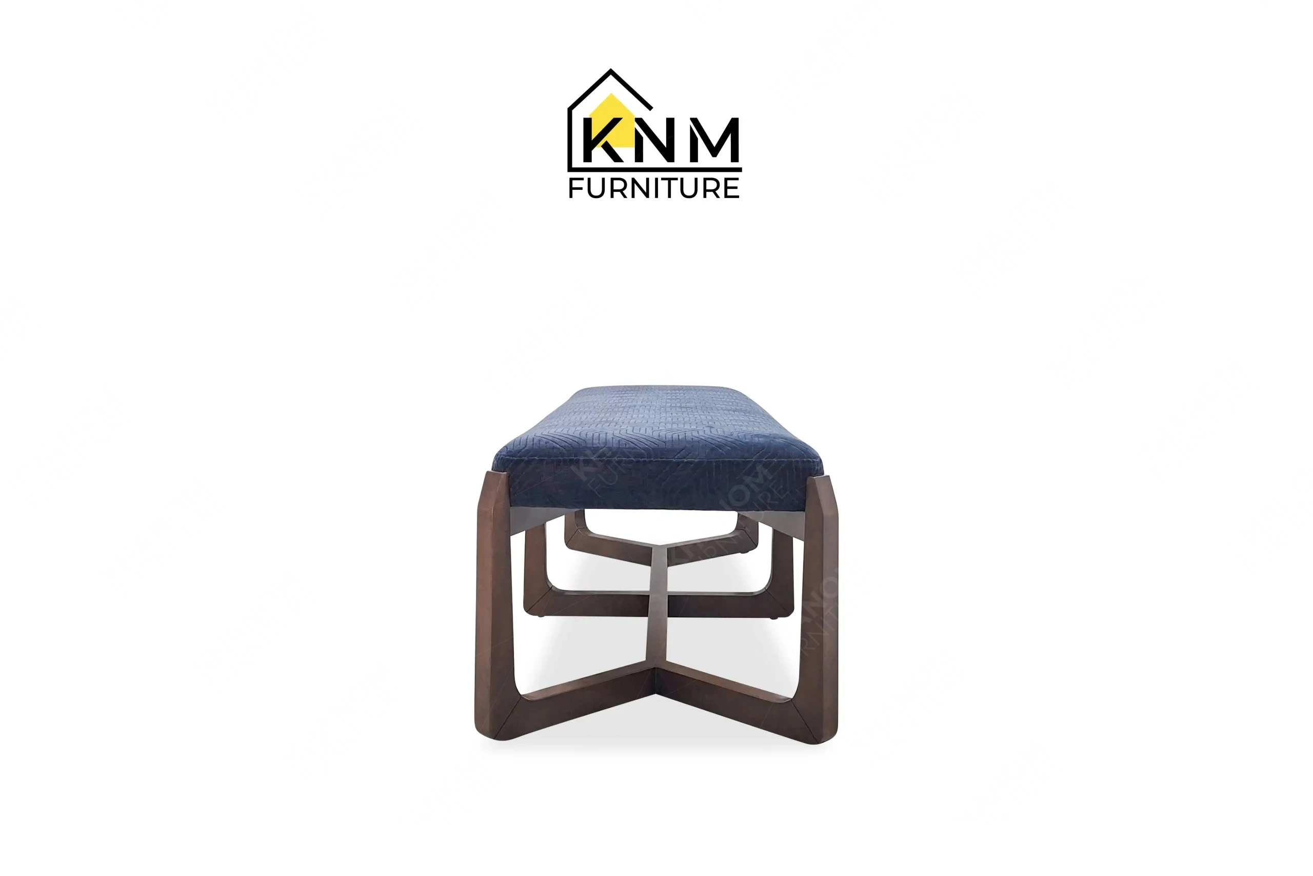 The side profile of the Fabricut upholstered solid Beech dining bench highlights the trapezoidal leg structure specified by Khanom Furniture.