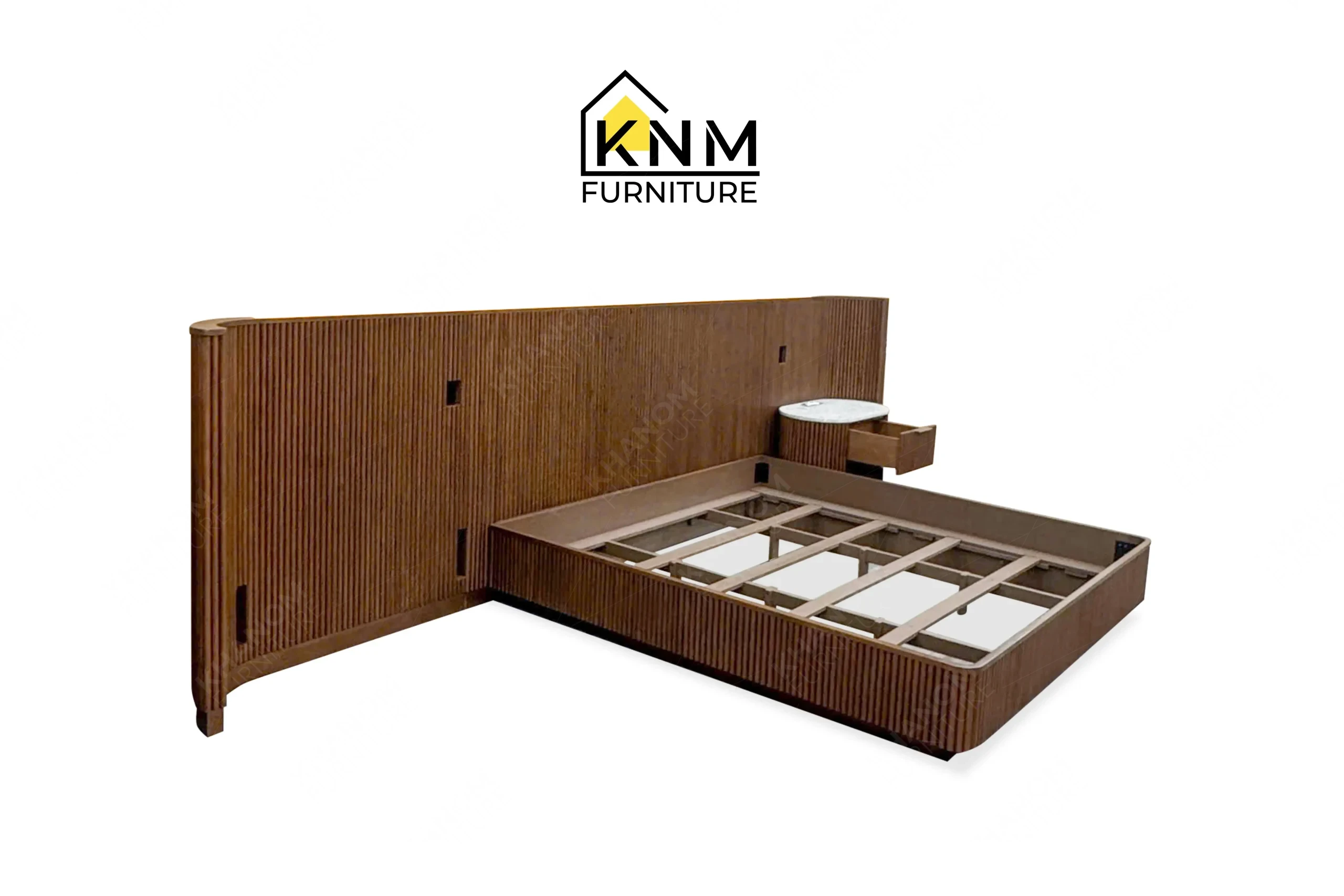 The side profile of the fluted hardwood King bed system highlights the flush wall-mounting configuration specified by Khanom Furniture.