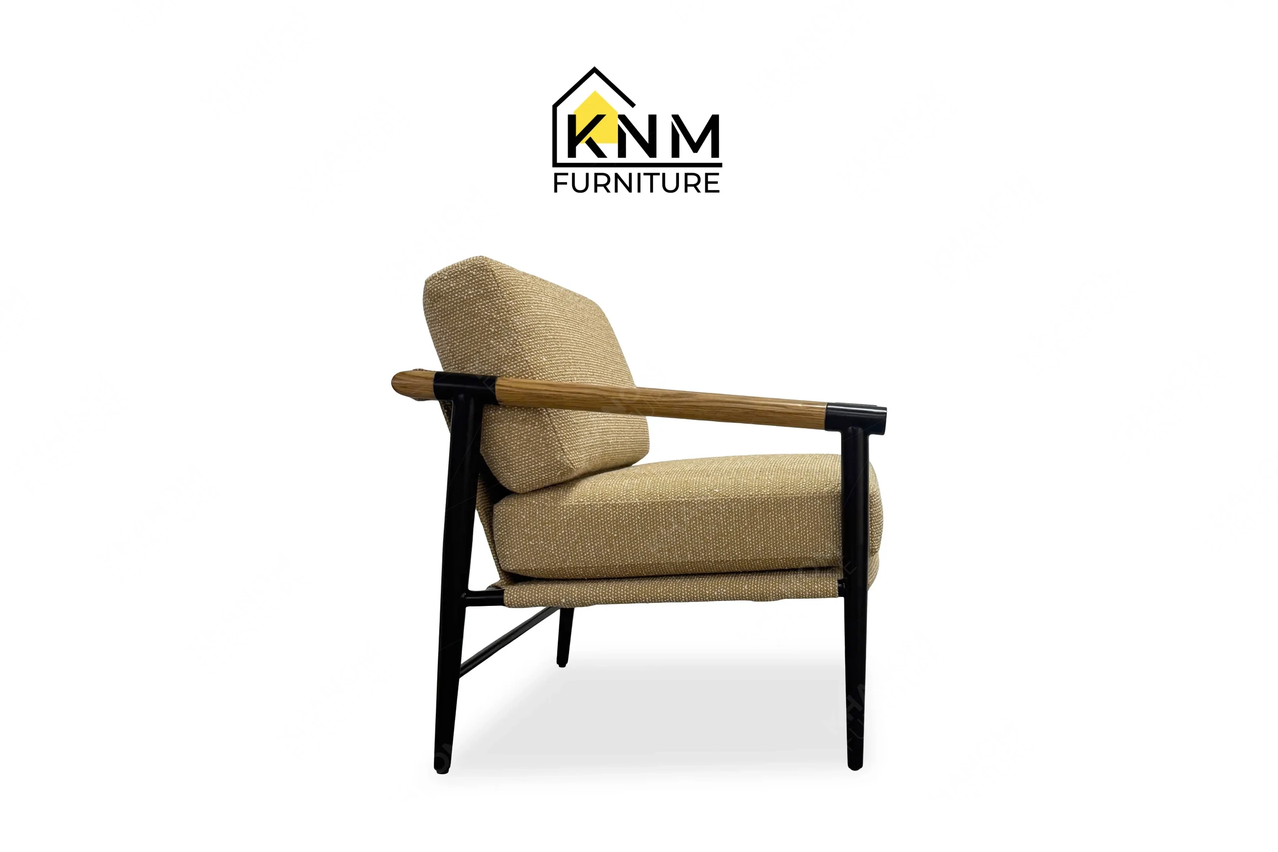The side profile of the Mayer upholstered metal oak lounge chair highlights the lateral metal framing and armrests specified by Khanom Furniture.