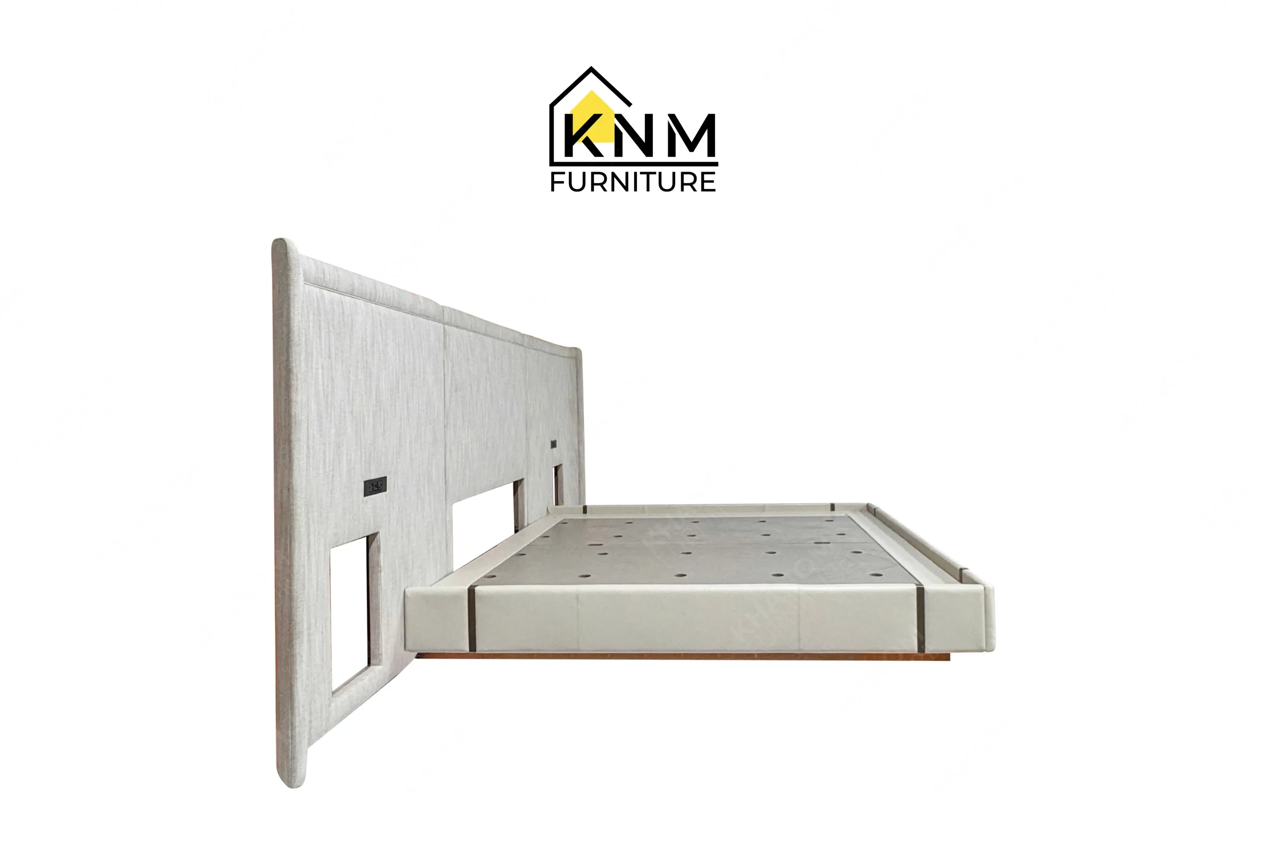 The side profile of the upholstered hotel bed base and headboard highlights the flush KD connections specified by Khanom Furniture.