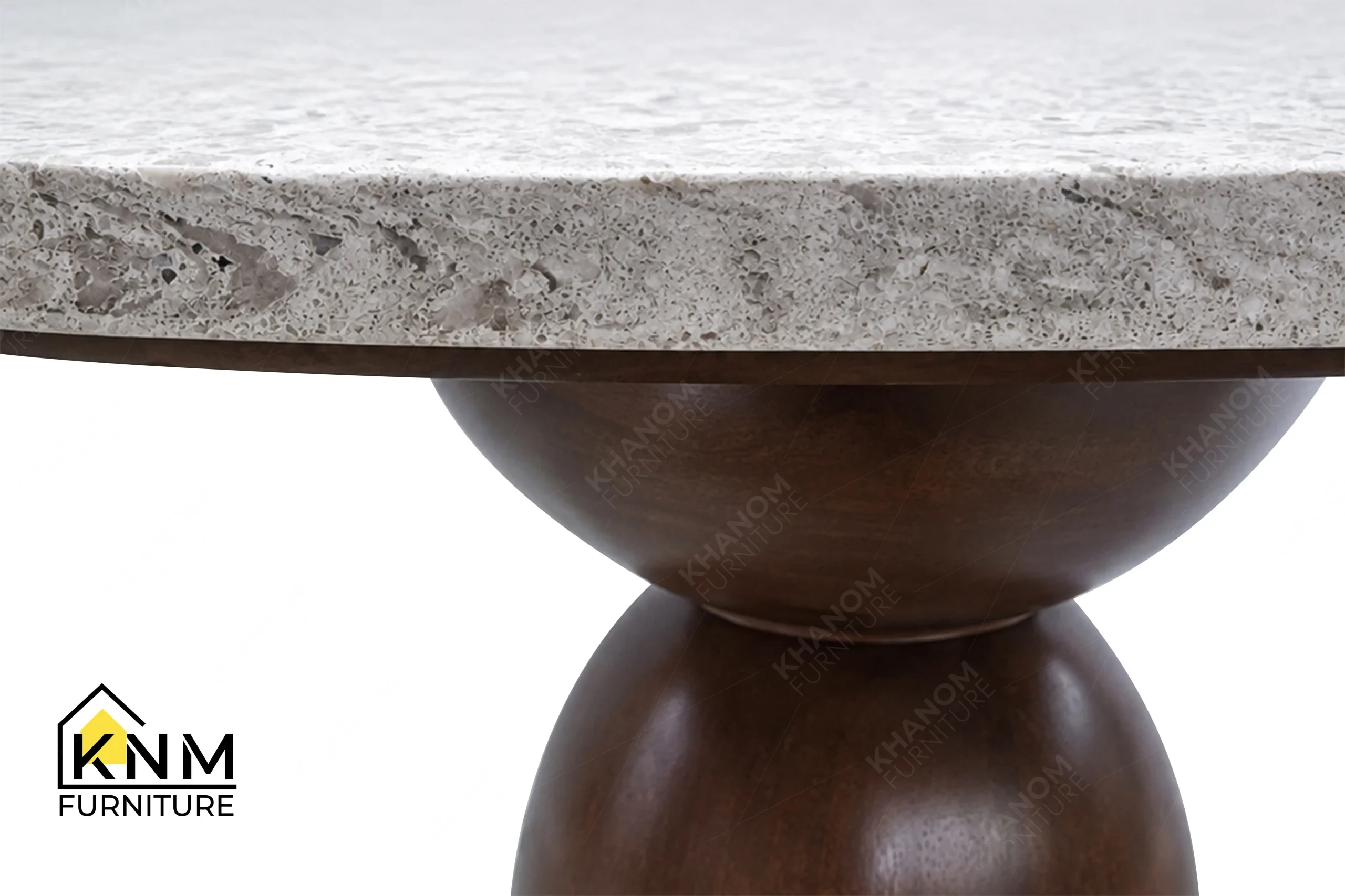 A technical detail of the Cambria quartz fiber veneer dining table from Khanom Furniture, describing the fiber core wrapped in Beech veneer.