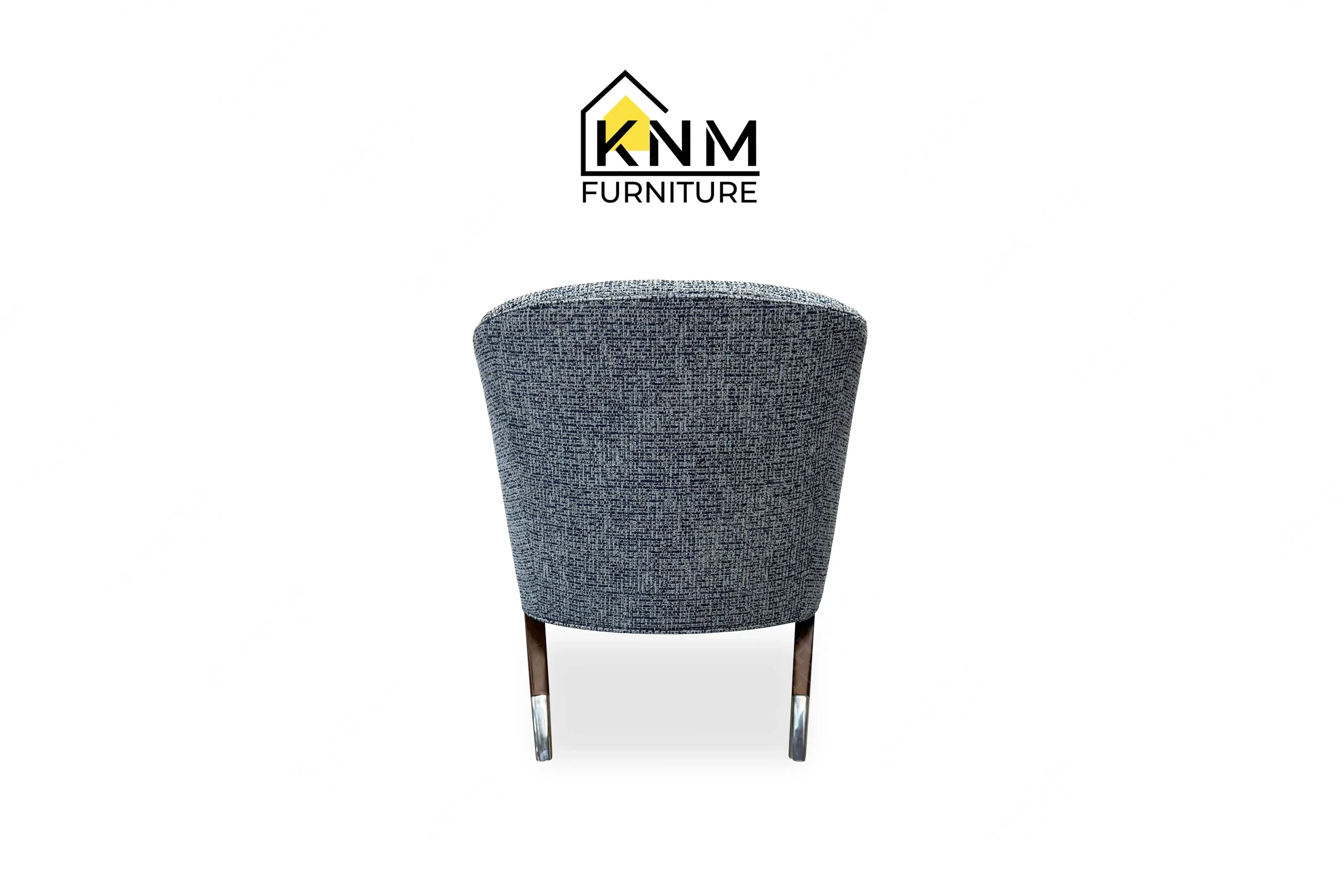 This rear view captures the continuous tight back upholstery of the Fabricut upholstered hardwood lounge chair engineered by Khanom Furniture.