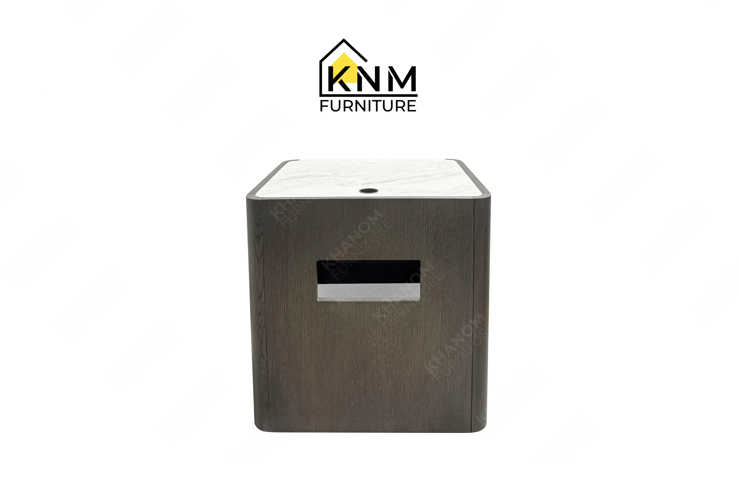 This rear view captures the continuous oak back panel and brass grommet of the Volakas marble Stoneguard lacquer oak nightstand engineered by Khanom Furniture.
